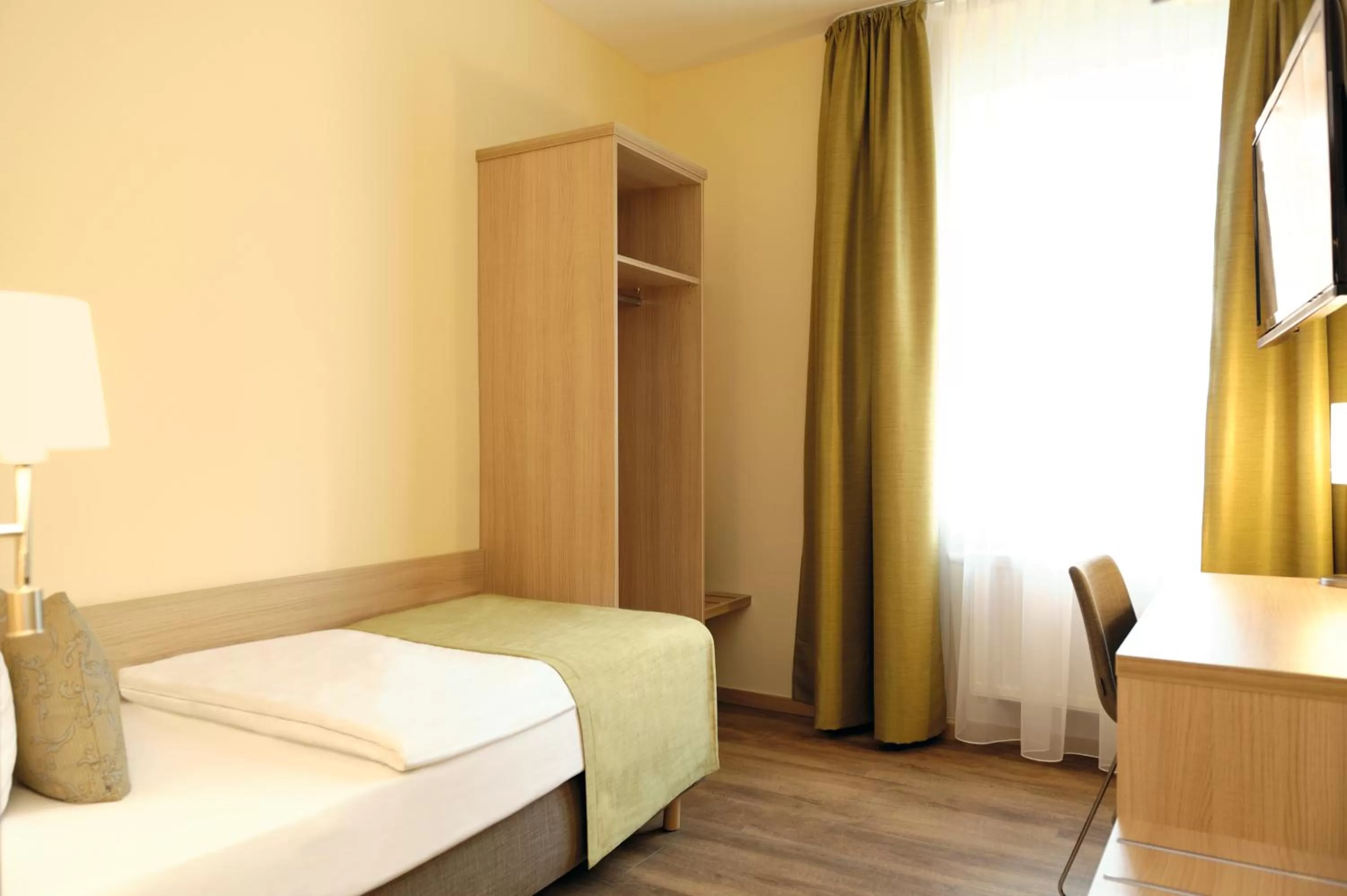 Photo of the whole room, Bed in Hotel & Gasthaus DAS RÖHRL Straubing