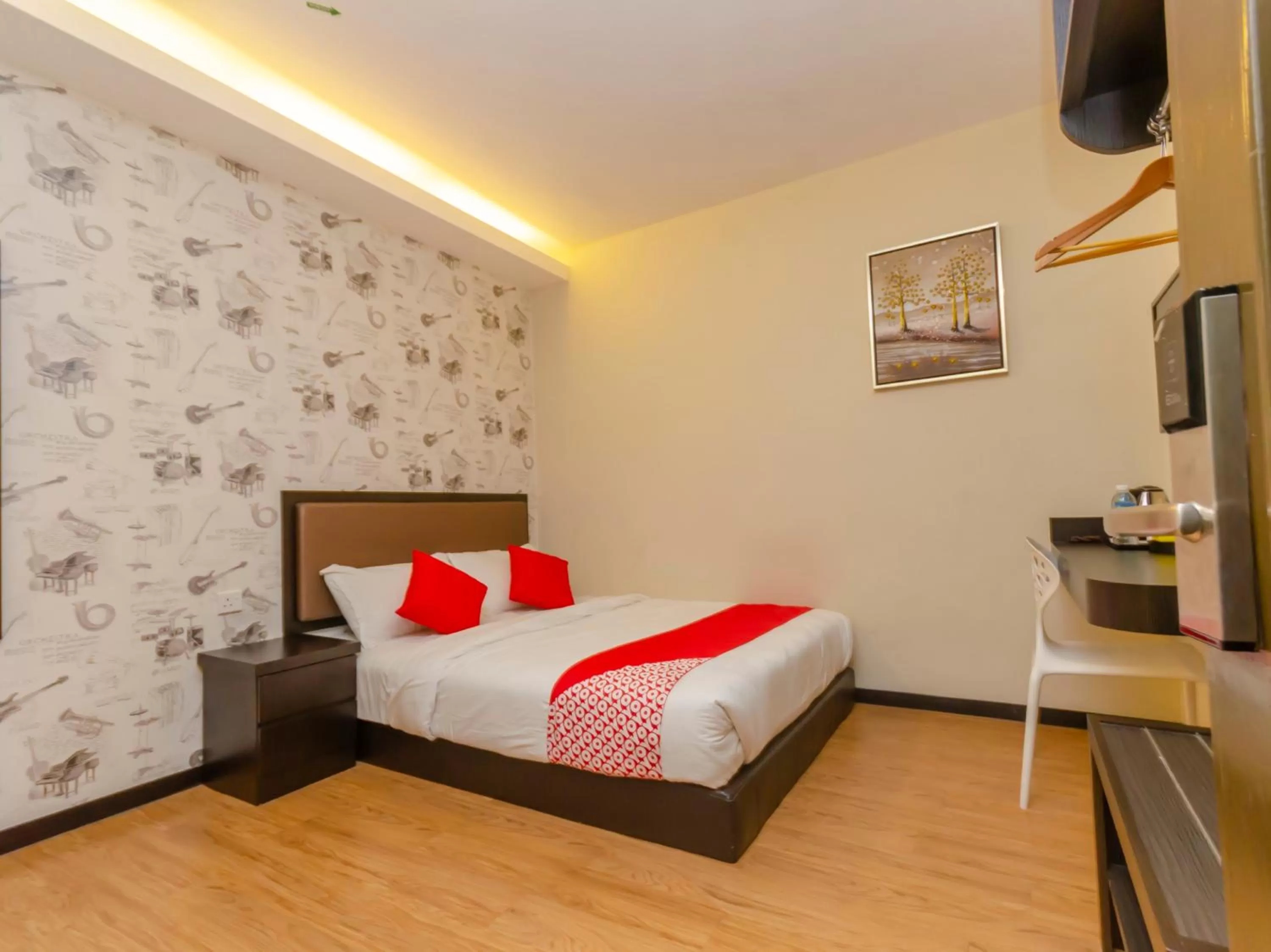 Bedroom in OYO 1214 Oro Hotel