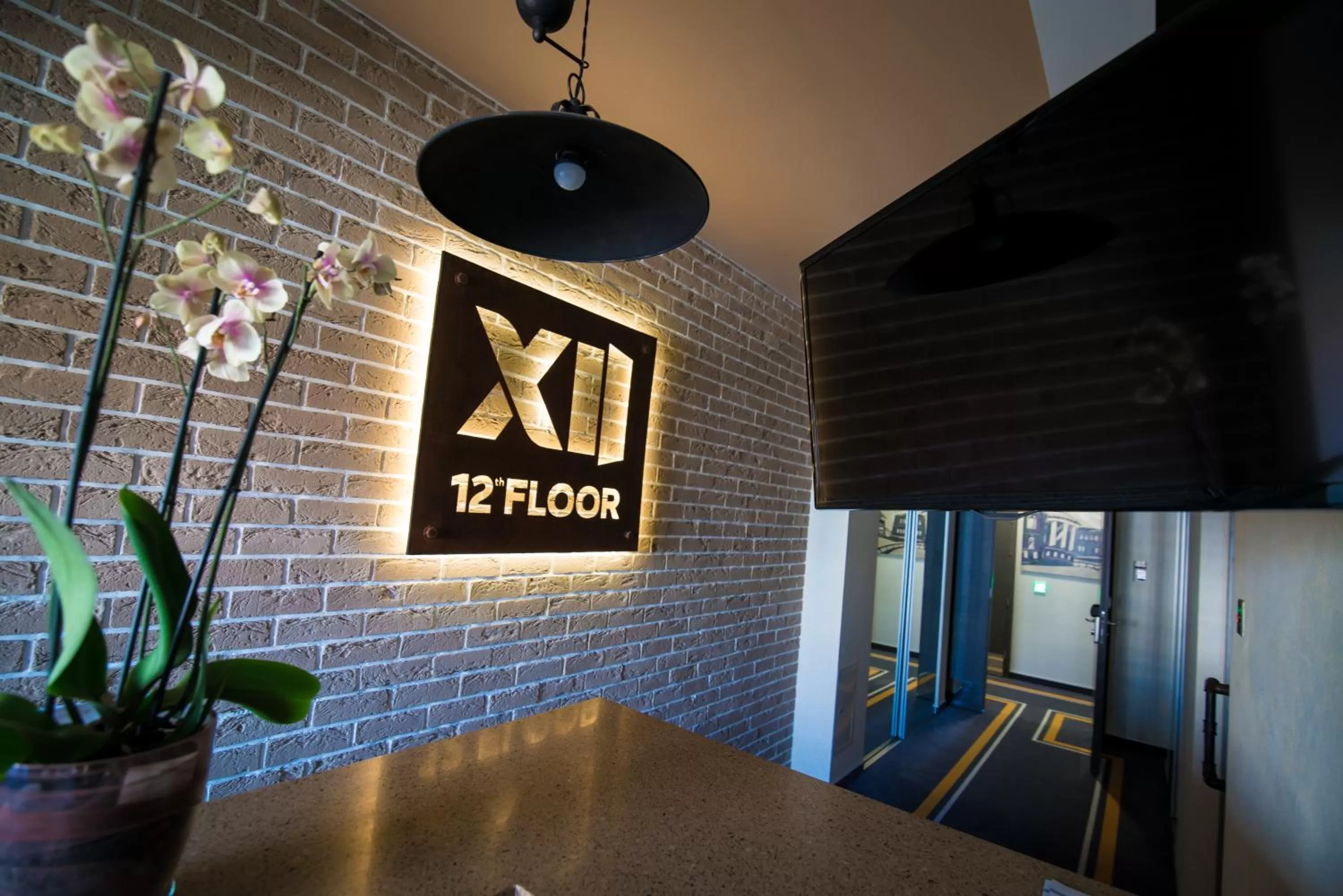 Property logo or sign in 12th Floor Apartments