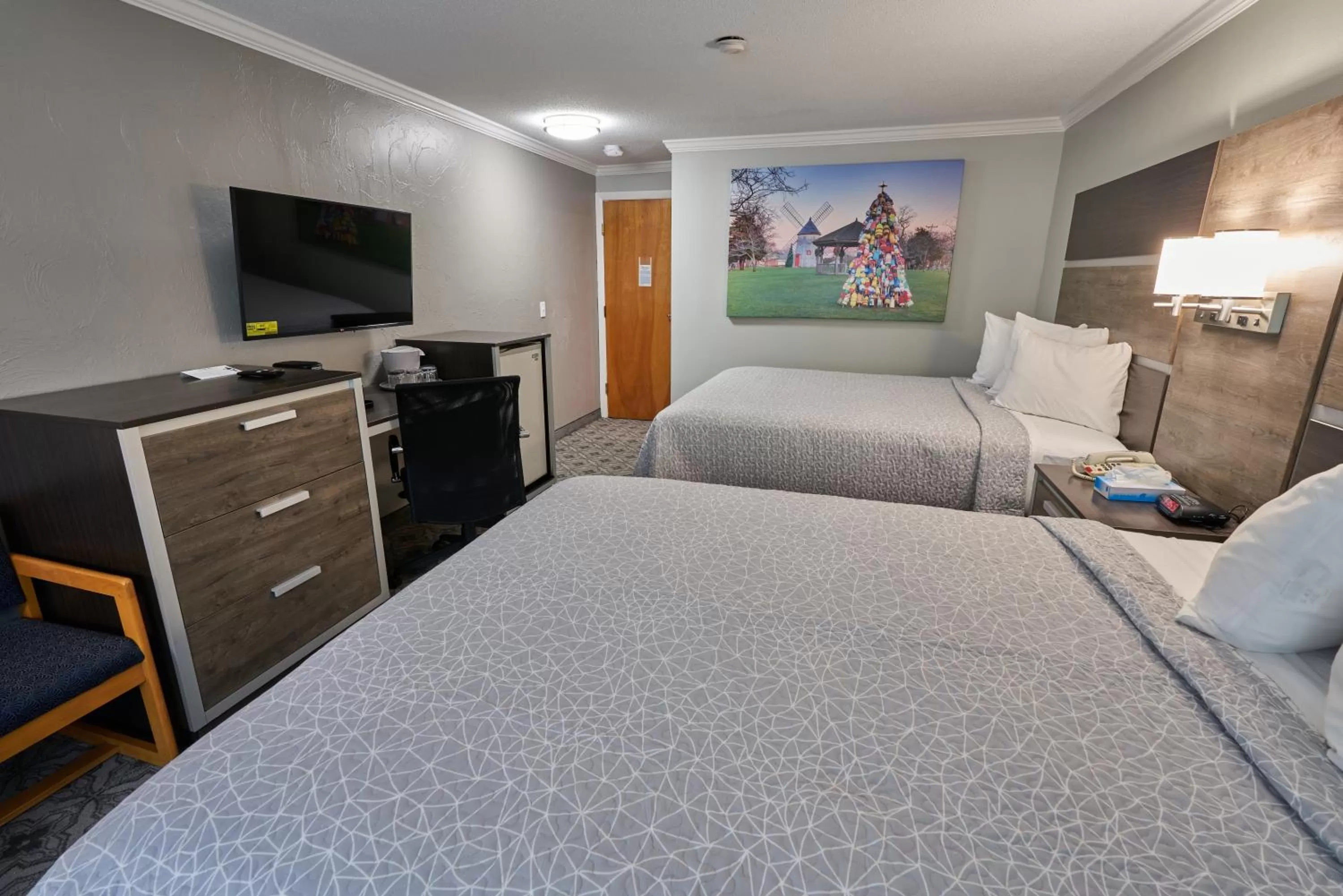 Bed in Ambassador Inn and Suites