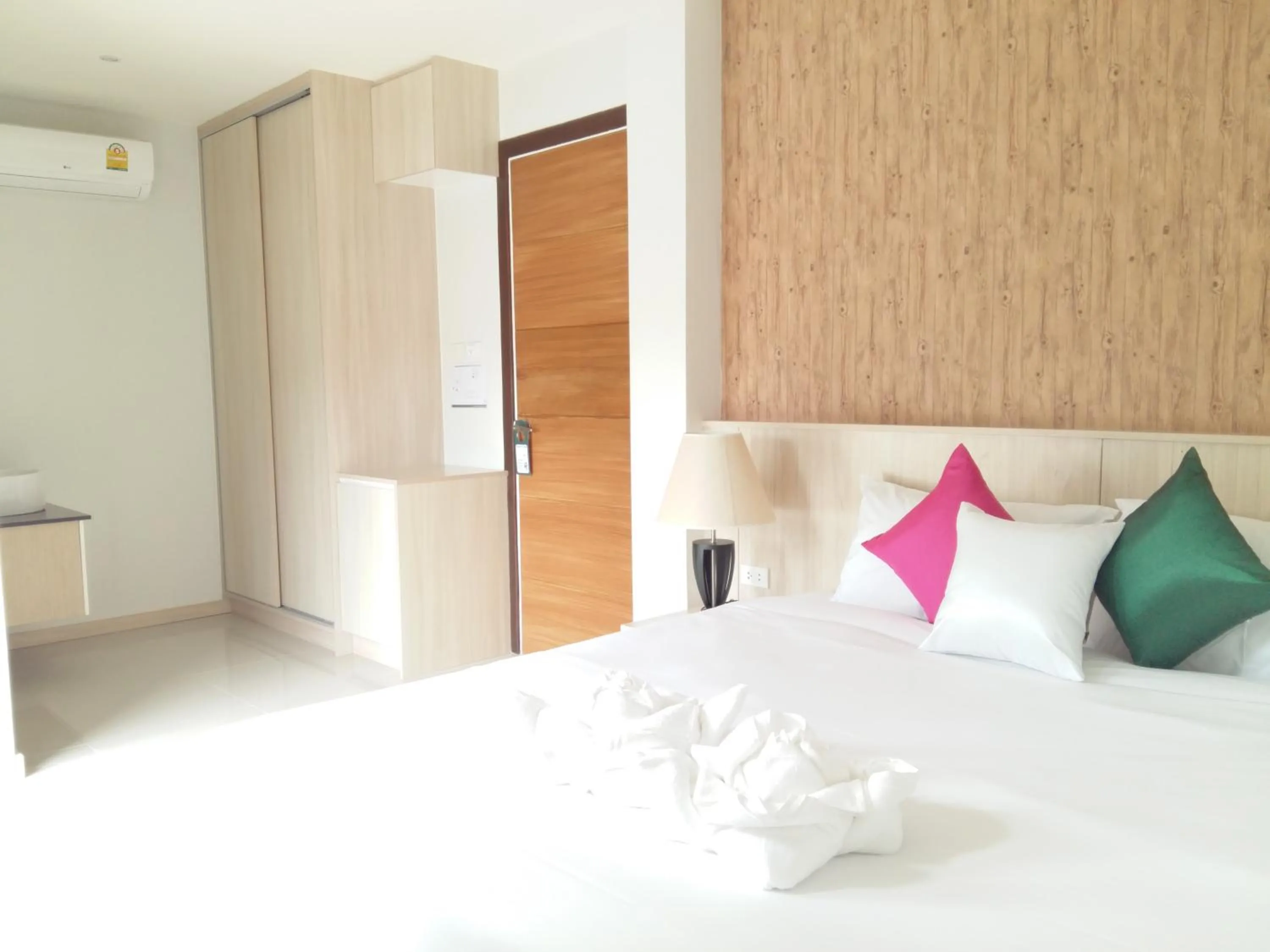 Bed in The Wings Boutique Hotels Krabi Ko Lanta