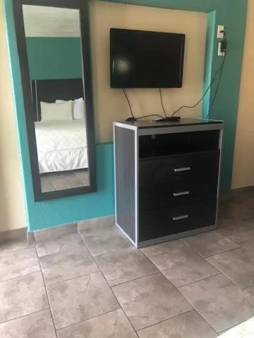 Bed in Pinn Road Inn and Suites Lackland AFB and Seaworld