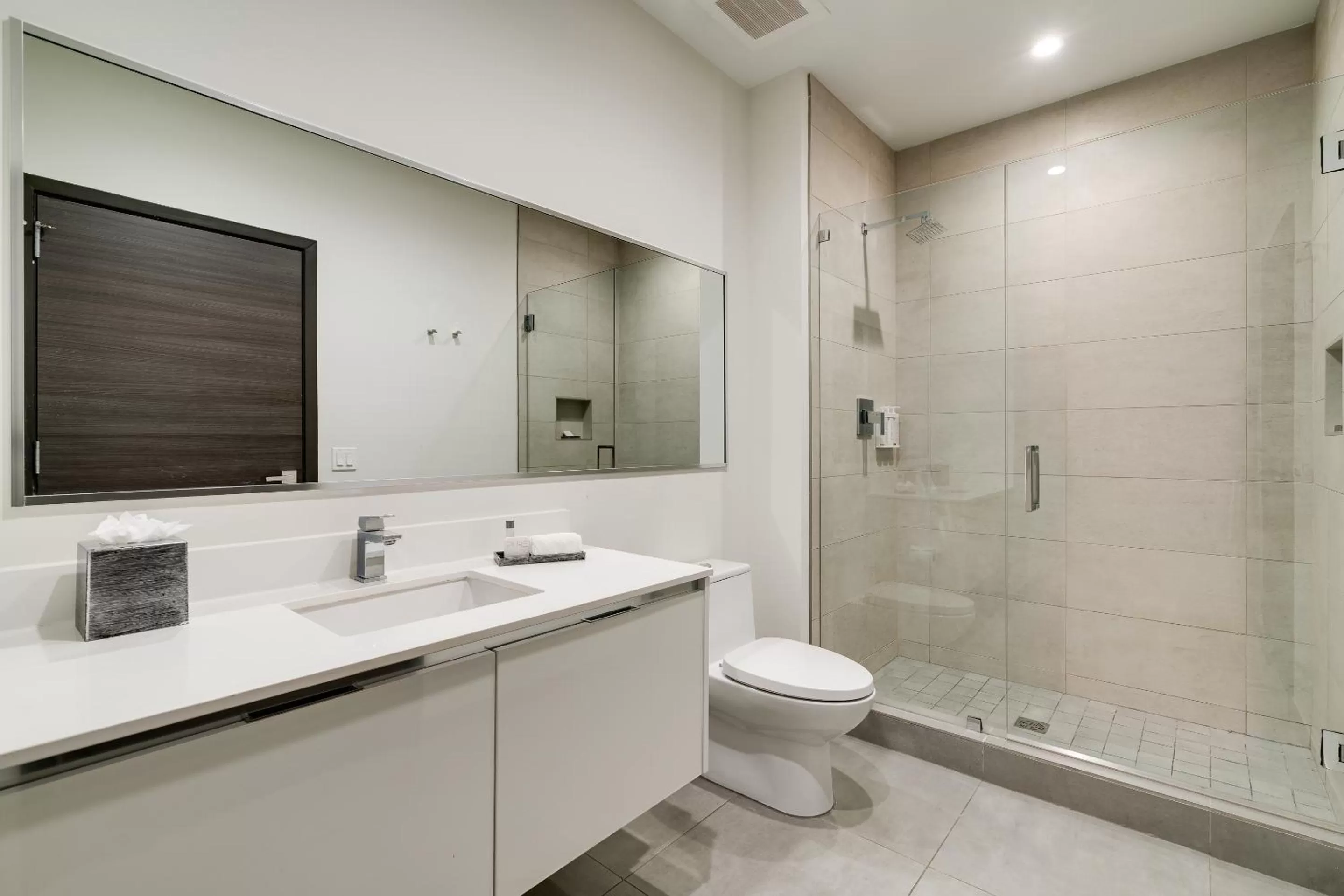 Shower in Costa Hollywood Beach Resort - An All Suite Hotel