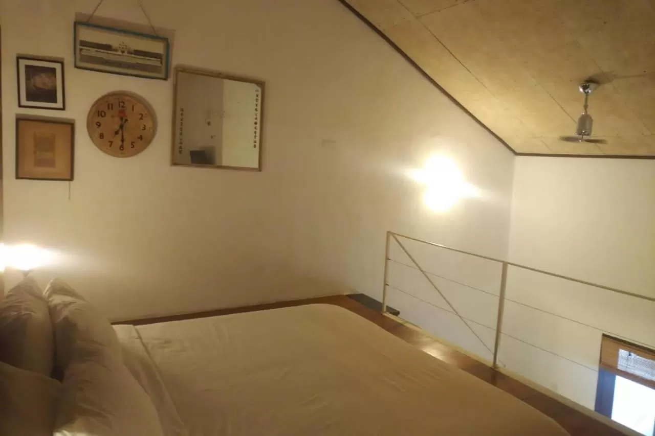 Bed in Ren I Tang Heritage Inn