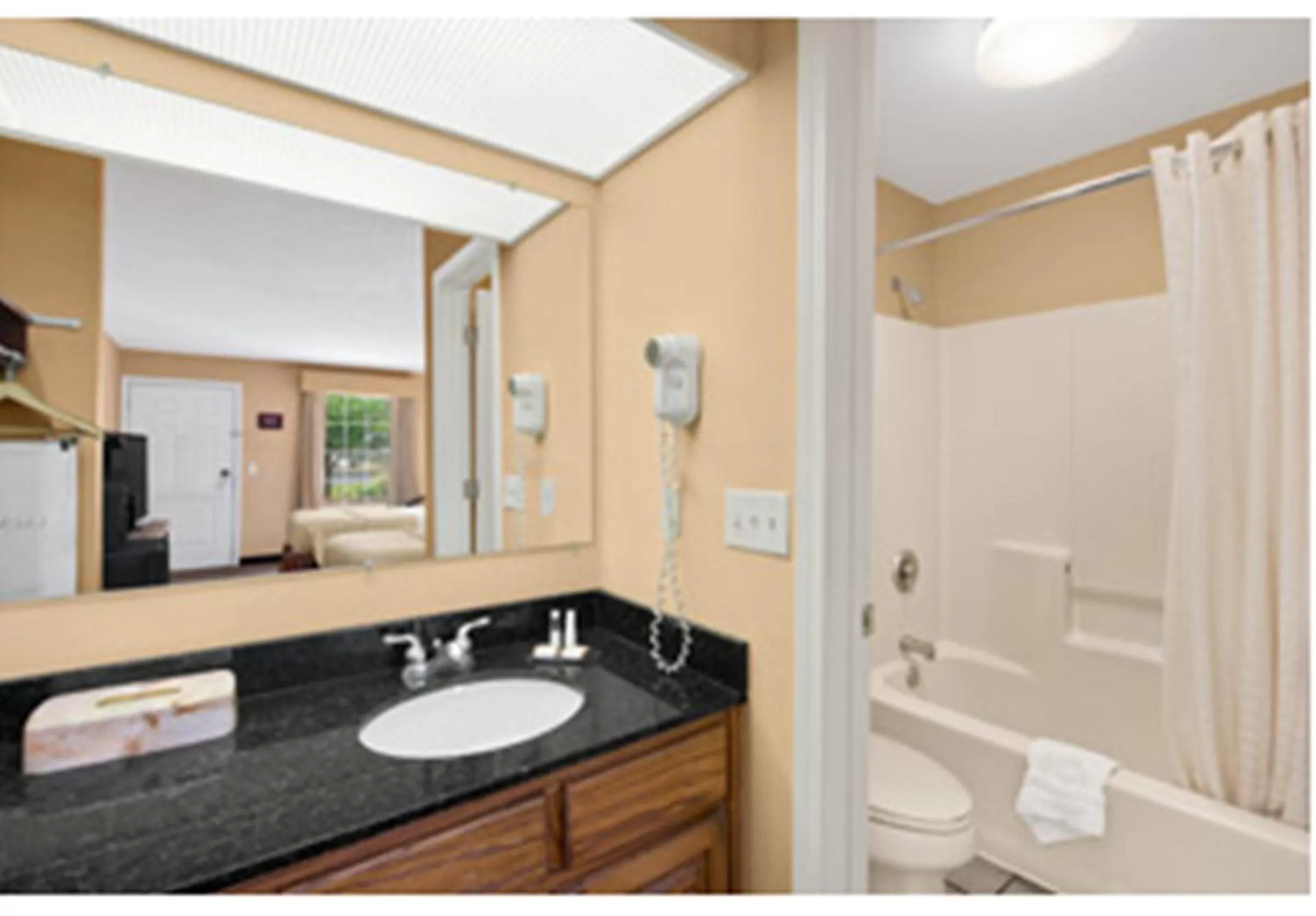Bathroom in Baymont by Wyndham Sanford