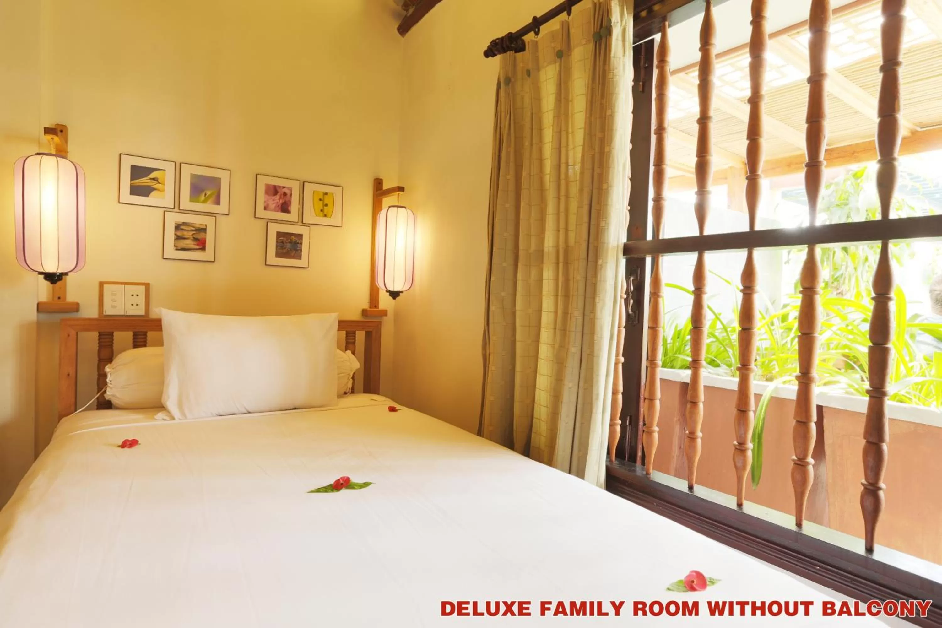 Bed in Hoi An Pho Library Hotel