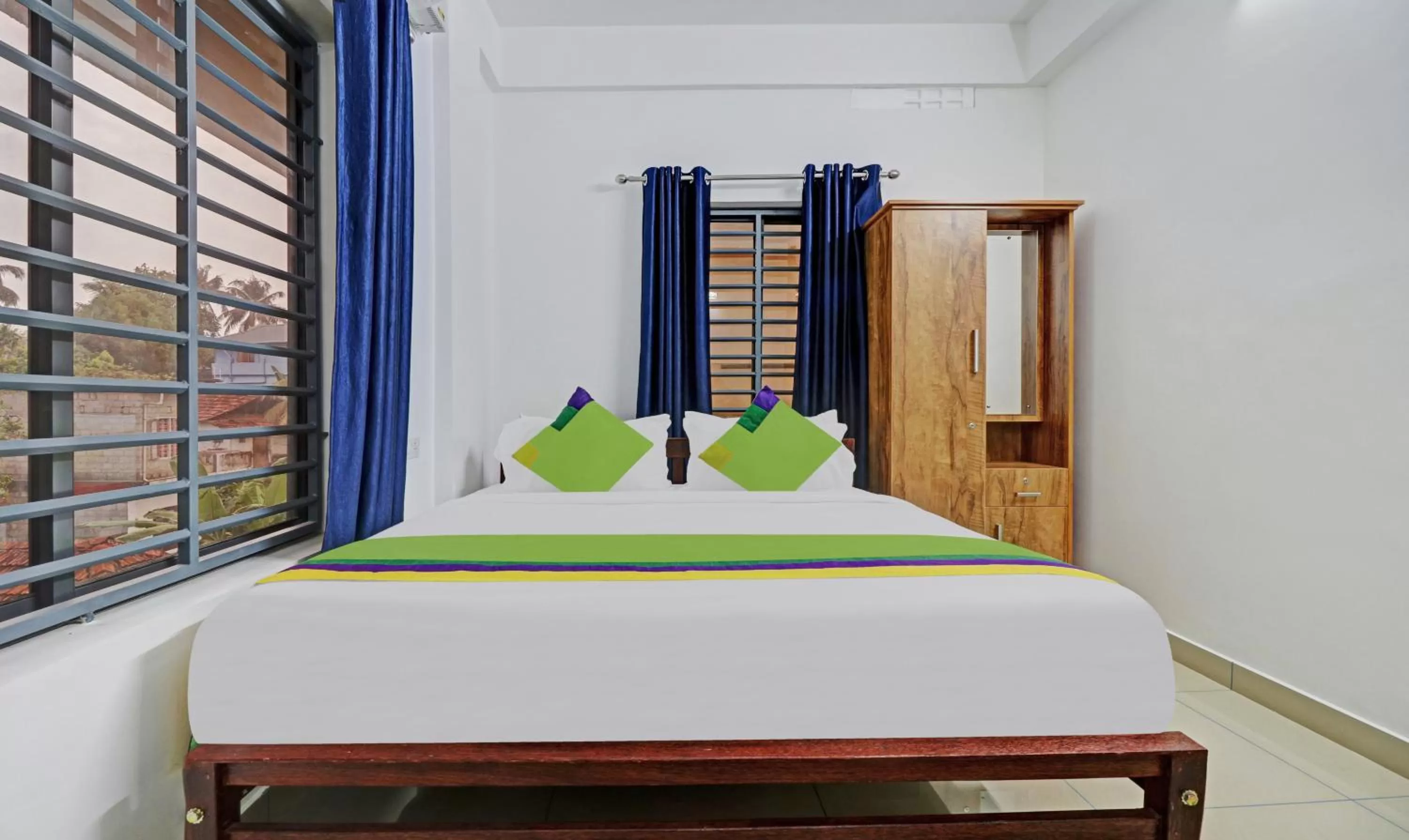 Bedroom, Bed in Treebo Trend Nirupama Apartment