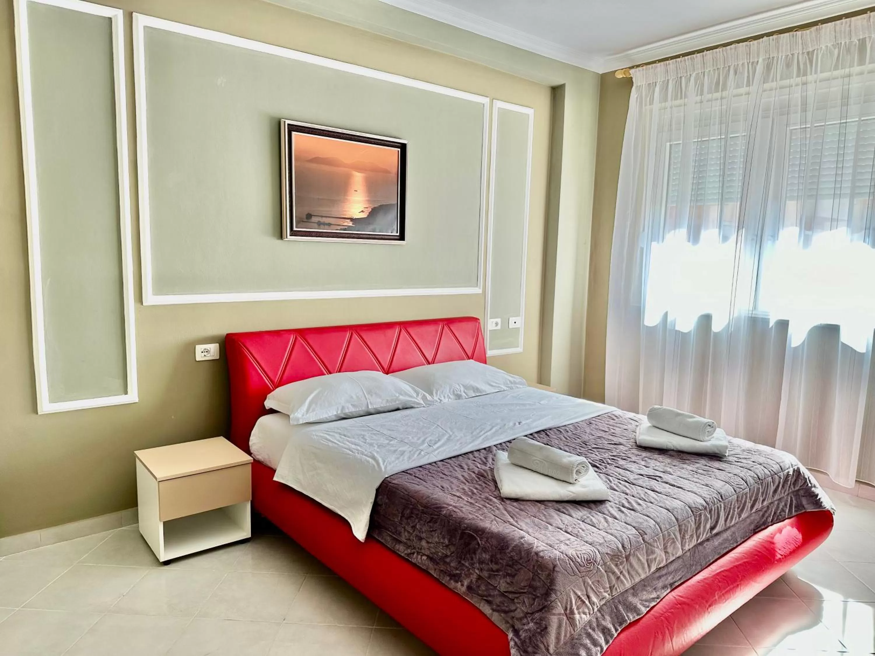 Bed in FAMILY SUITE RESIDENCE