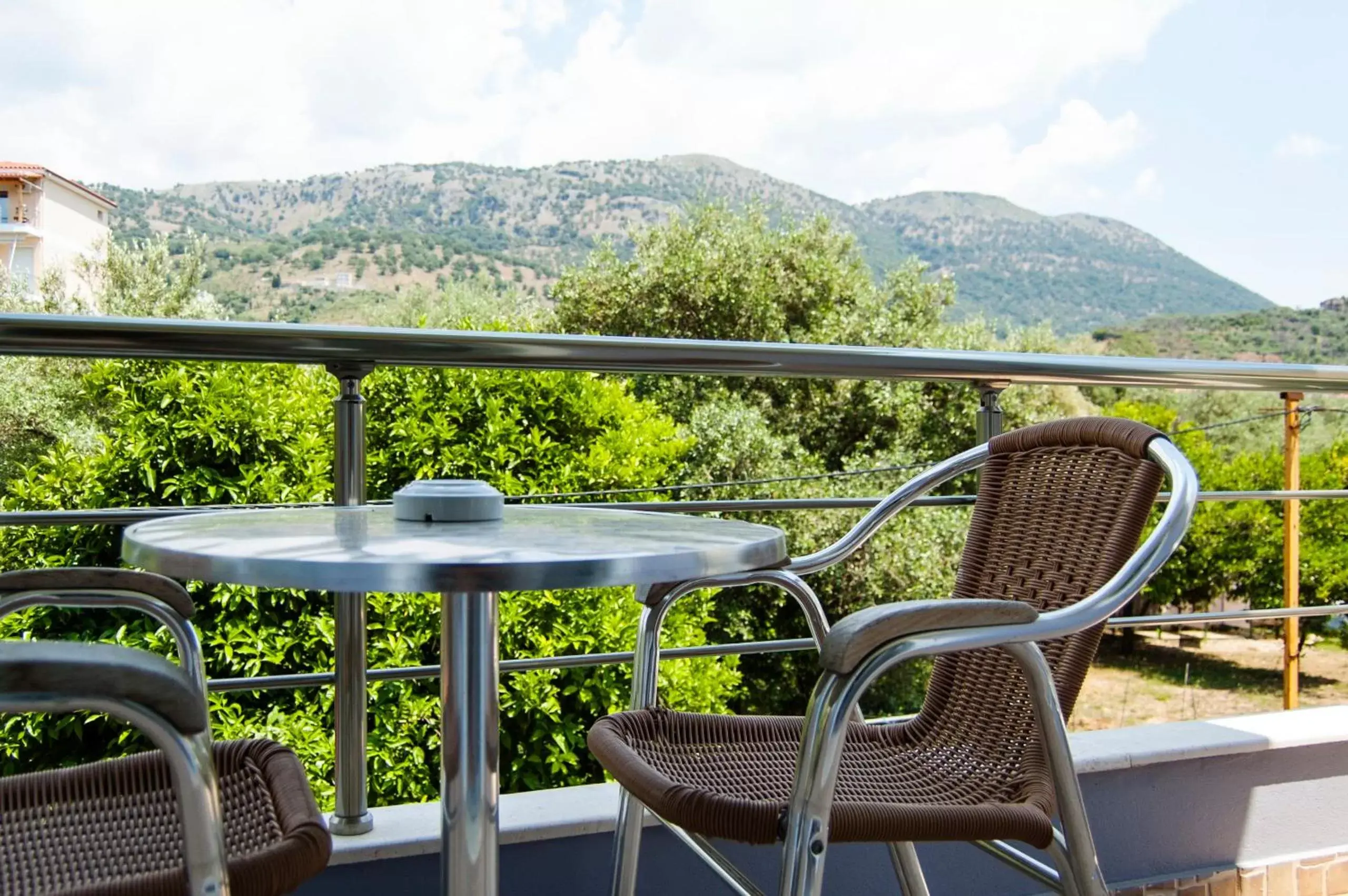 Twin Room with Balcony and Mountain View in Dhima Hotel Twin Room with Balcony and Mountain View in Dhima Hotel