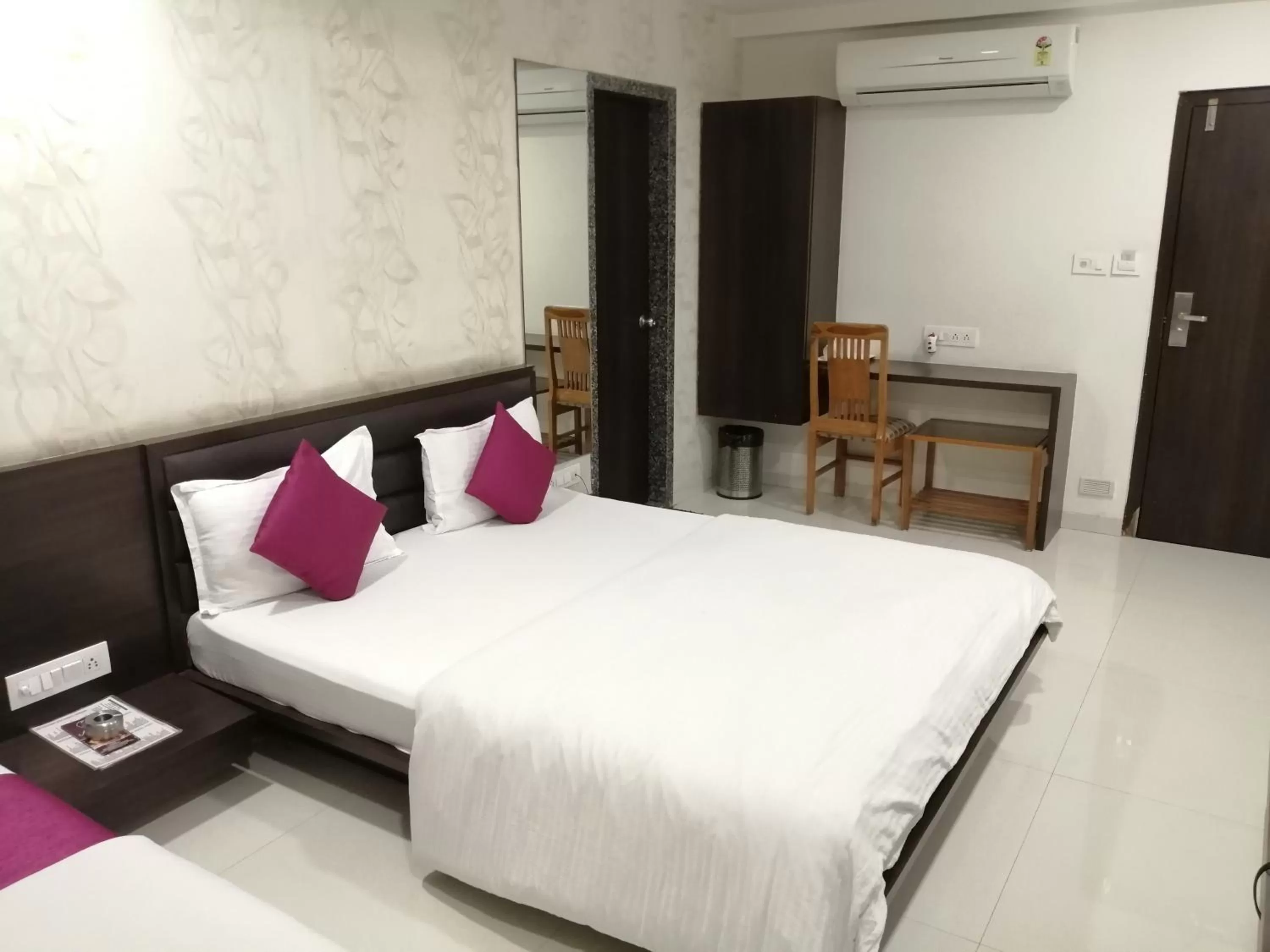 Bed in The Pacific Hotel