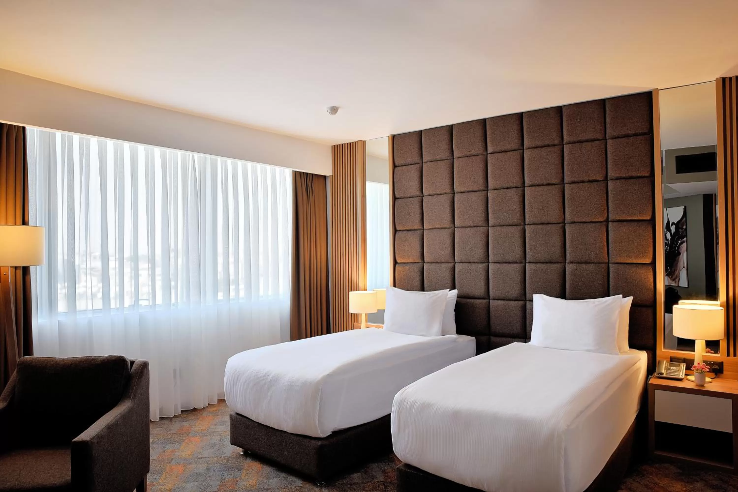 Bed in Grand Sapphire City Hotel