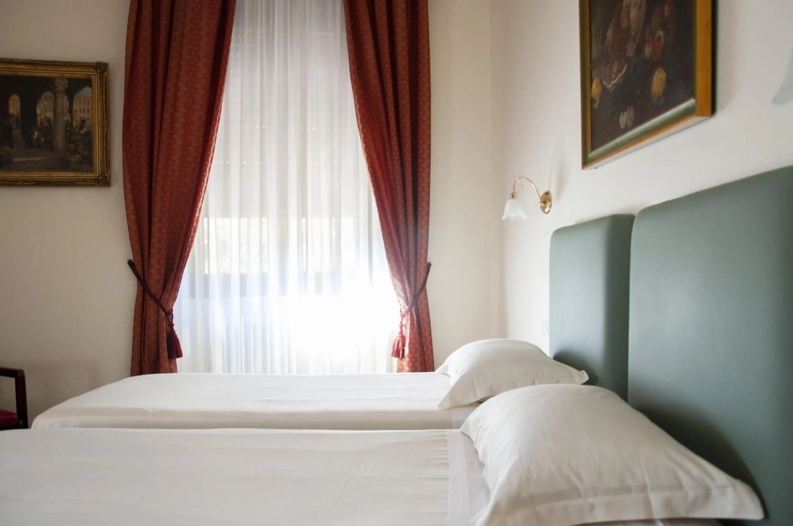 Bed in Hotel San Guido
