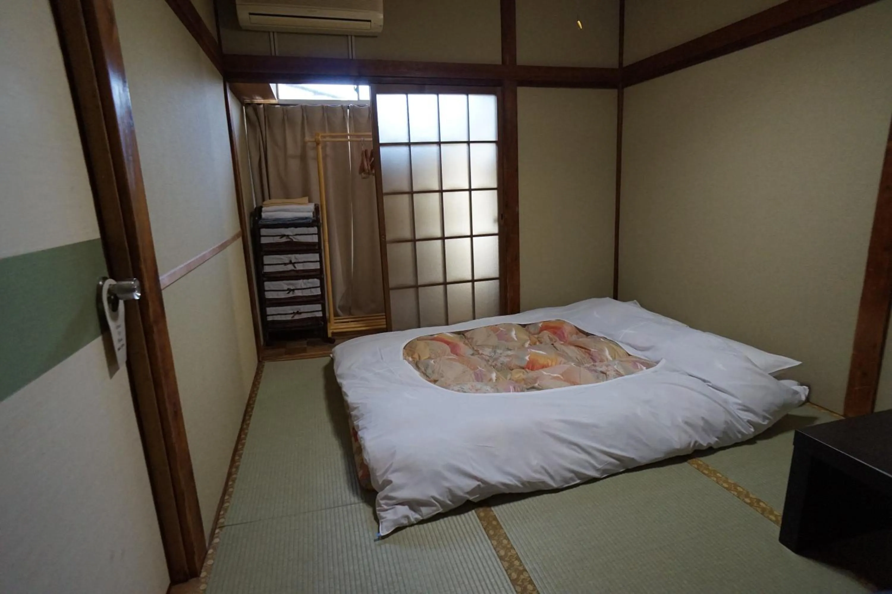 Photo of the whole room, Bed in Ryokan Katsutaro
