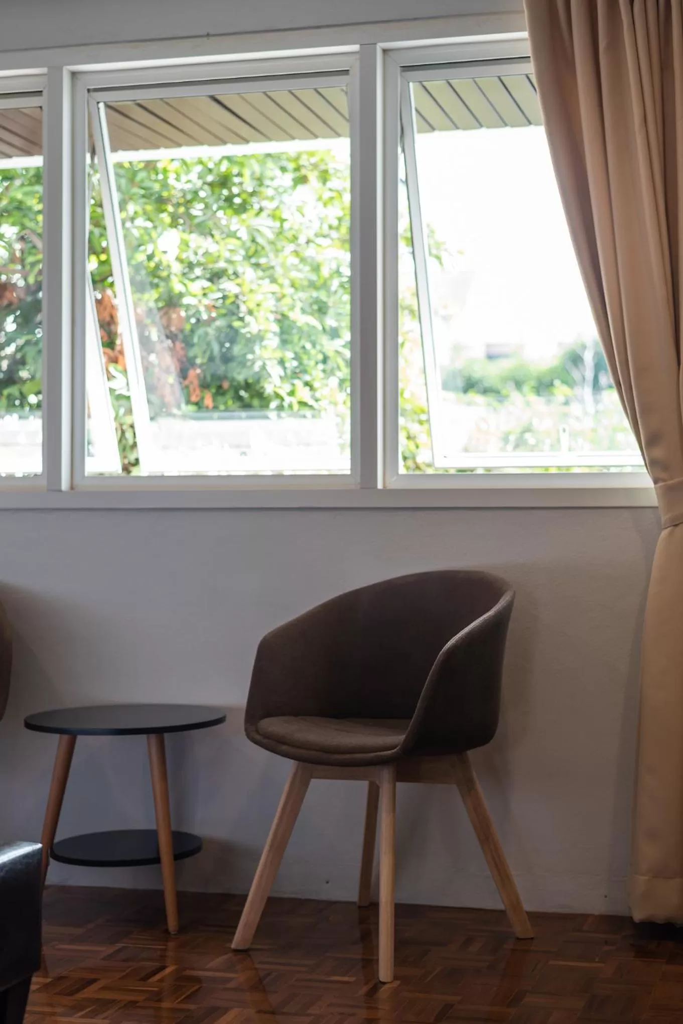 Seating area in The Mellow Pillow Hotel @ Chiang Mai Gate