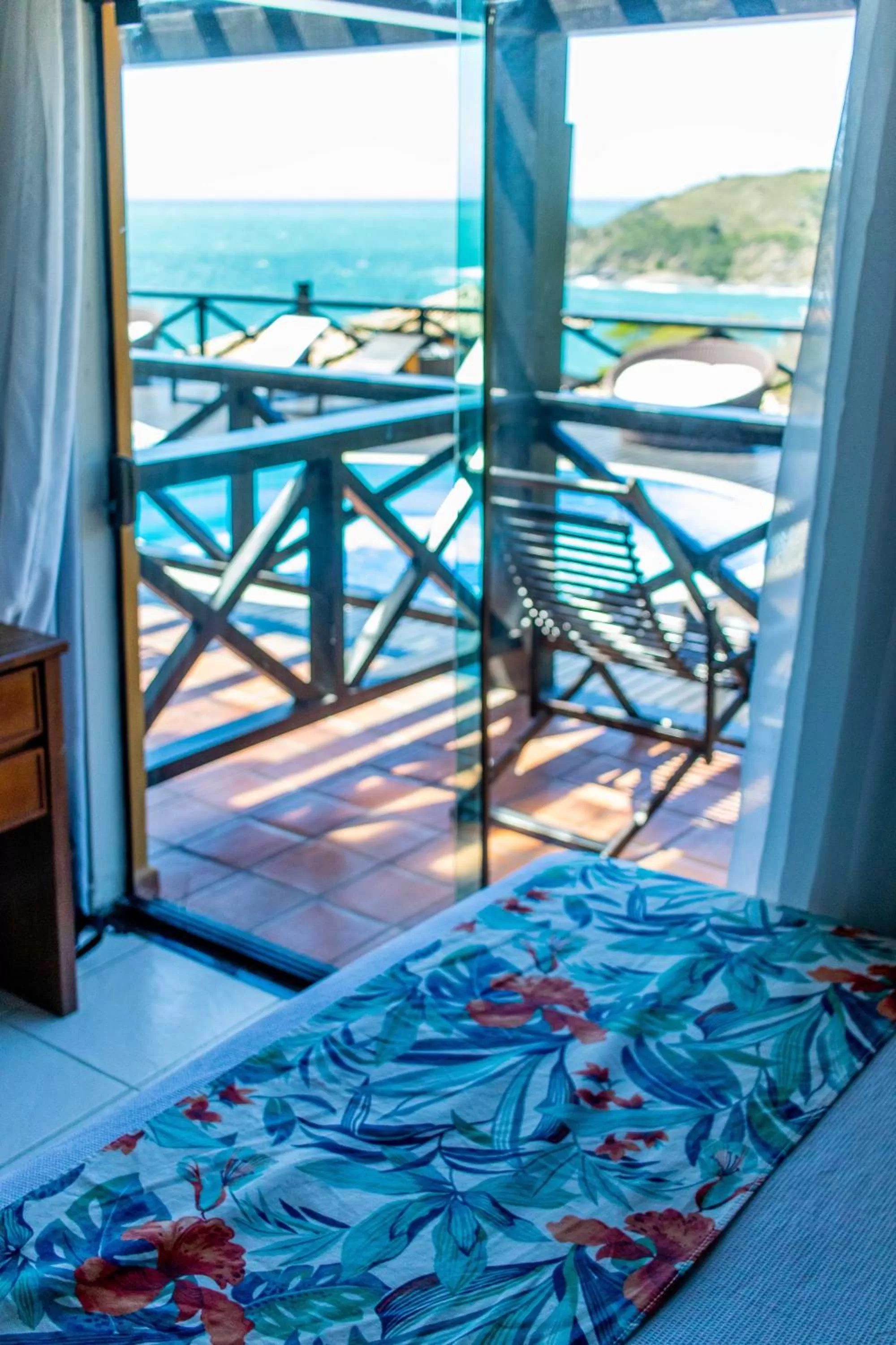 Balcony/Terrace, Bed in Hotel Pousada Brava Club