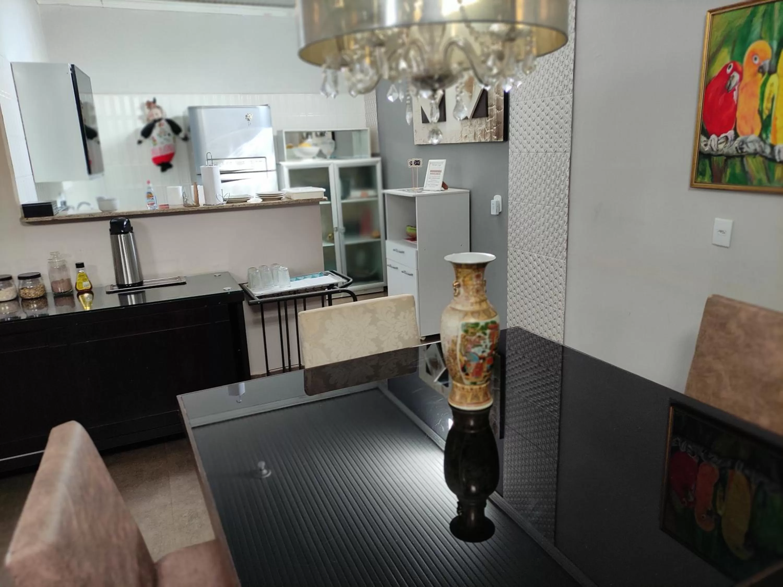 Dining area in Pousada da Gi Suítes e Turismo