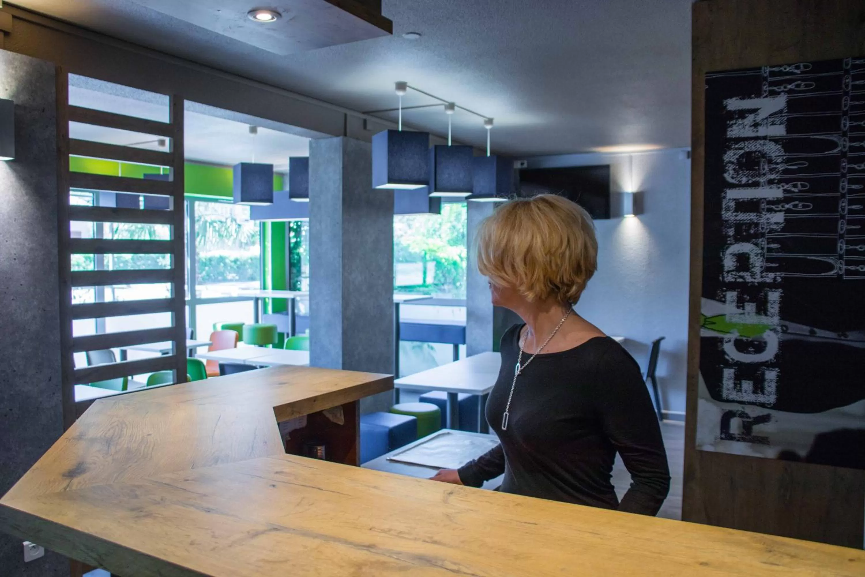 Lobby or reception in ibis budget Carcassonne La Cité