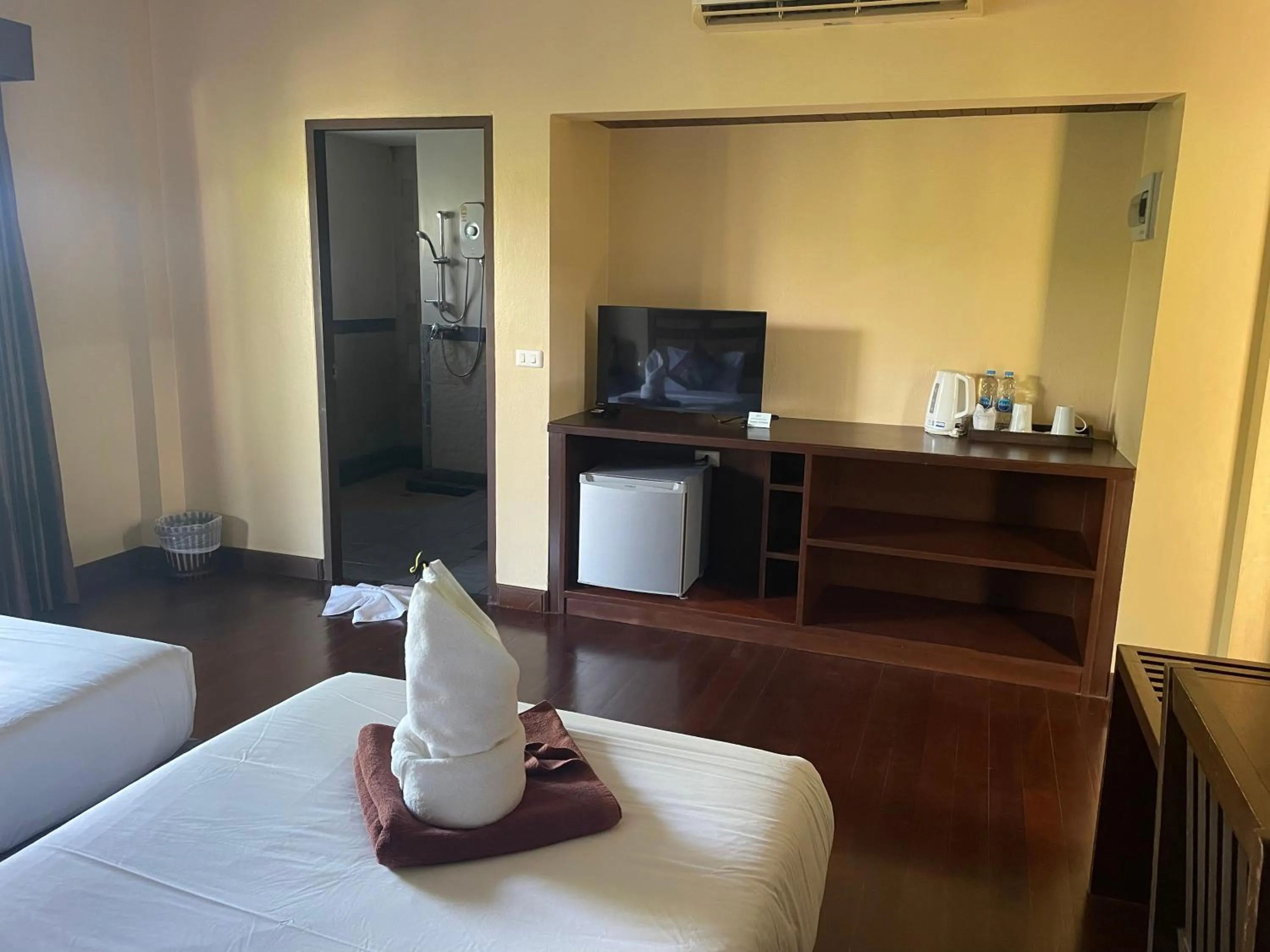 Bed in Grand Manita Beach Resort