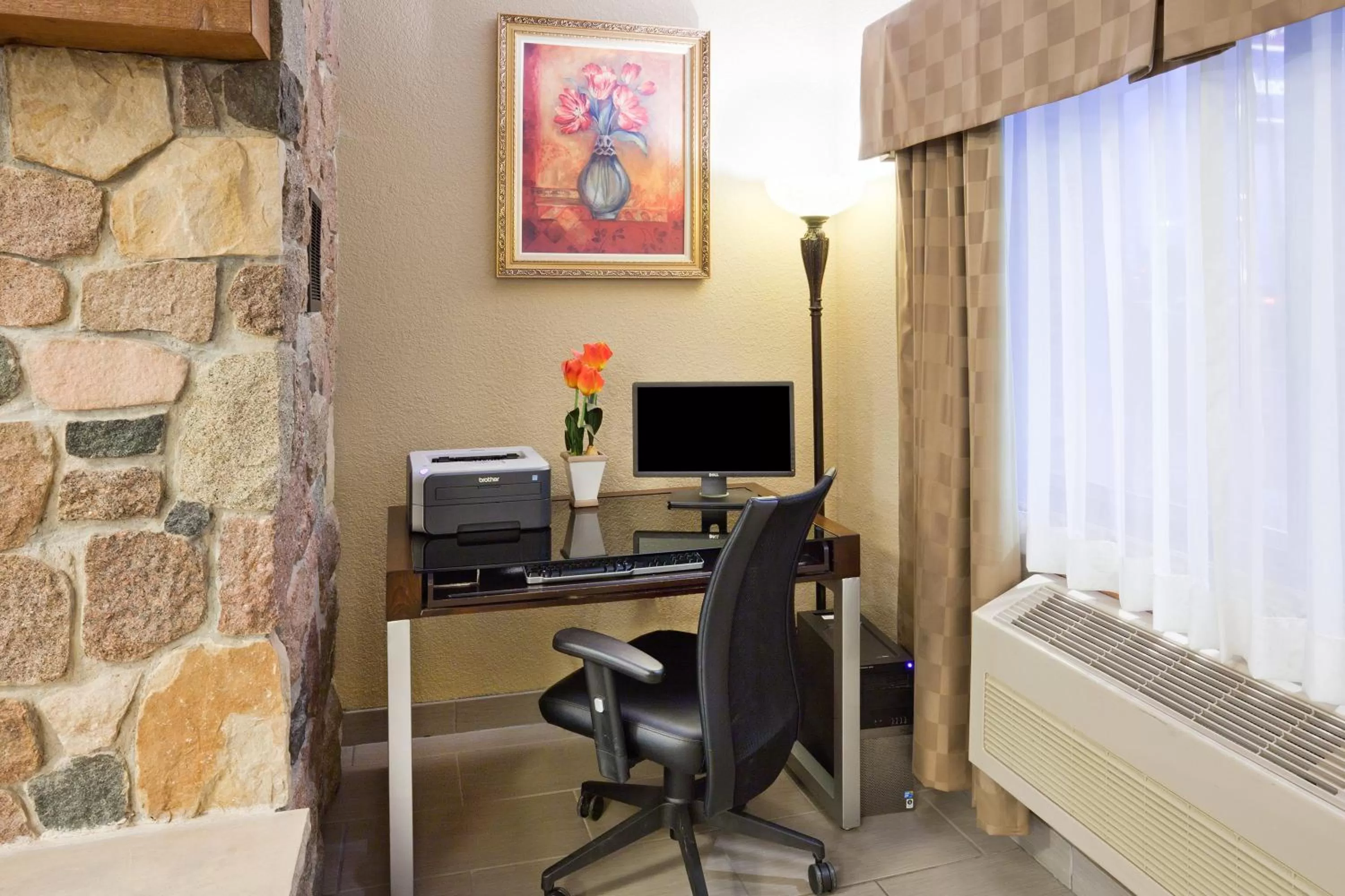 Lobby or reception in AmericInn by Wyndham Plover Stevens Point