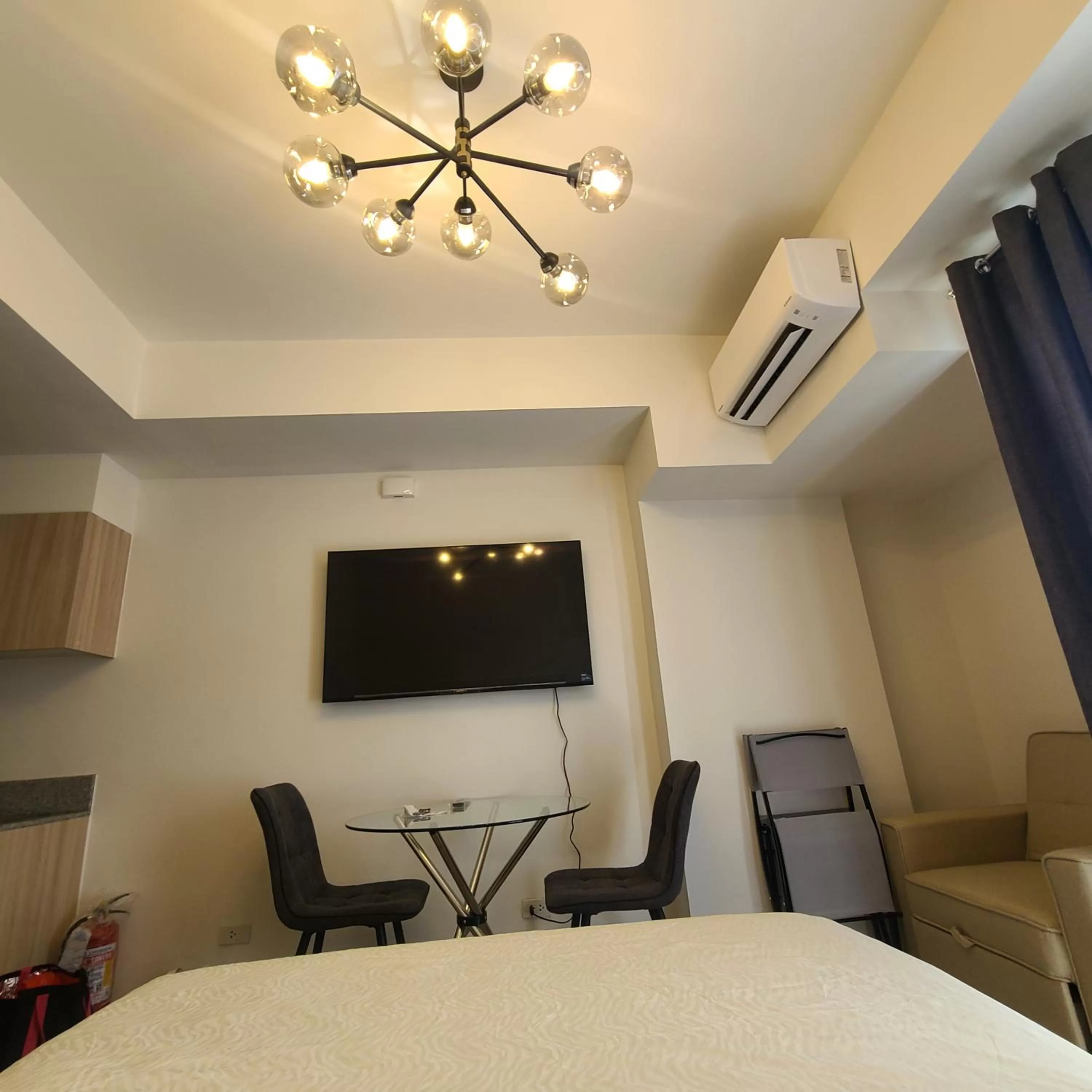 Seating area in INSPIRIA Condo Free Airport Pickup for 3 nights stay or more
