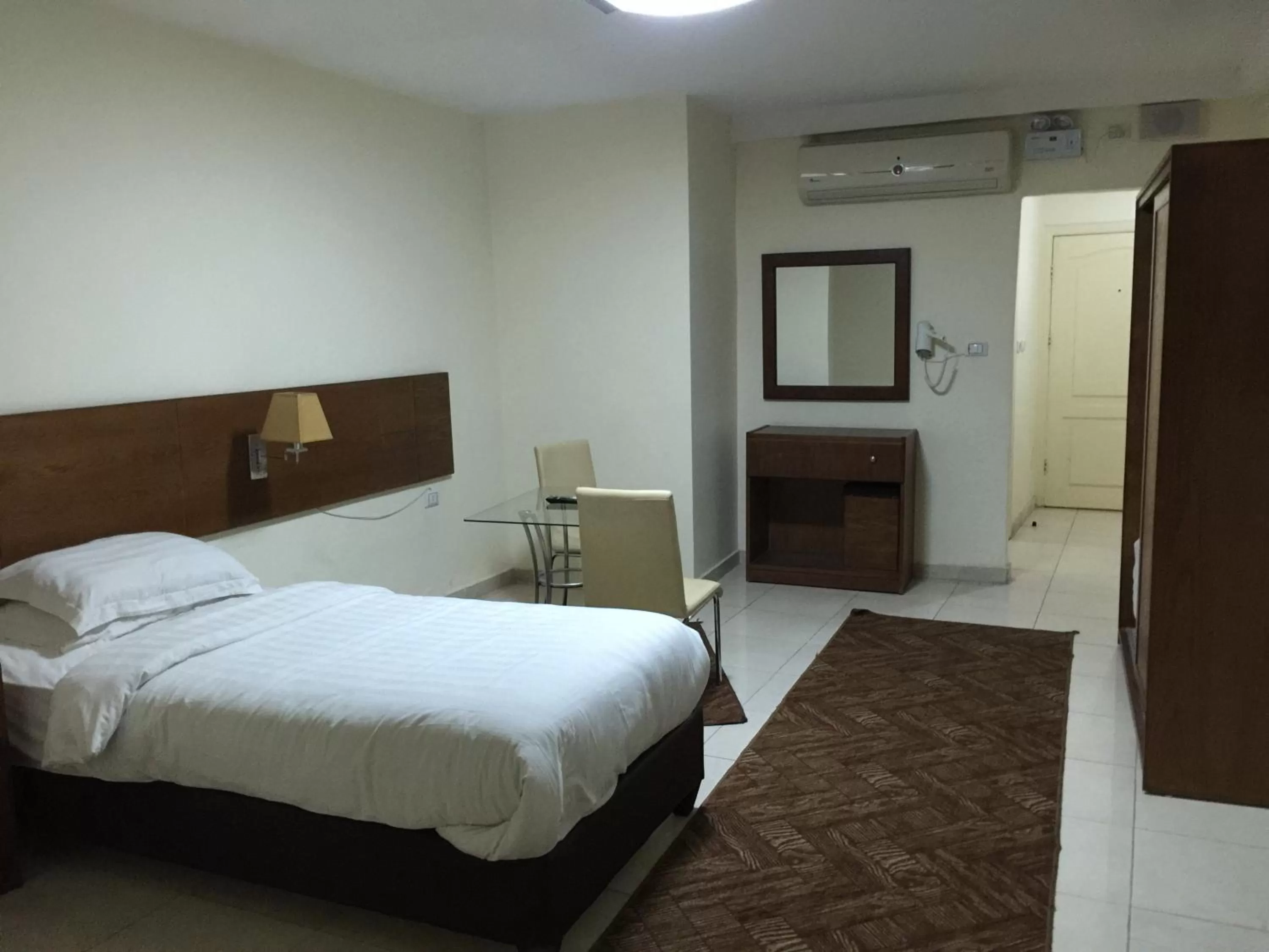 Bed in Zaina Plaza Hotel