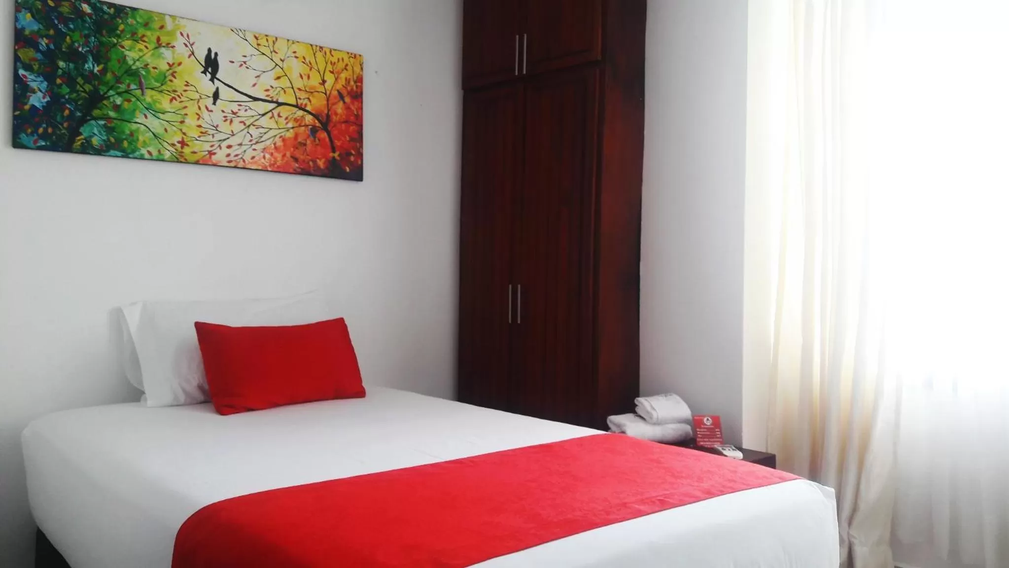 Bedroom, Bed in Hotel Cafe Plaza