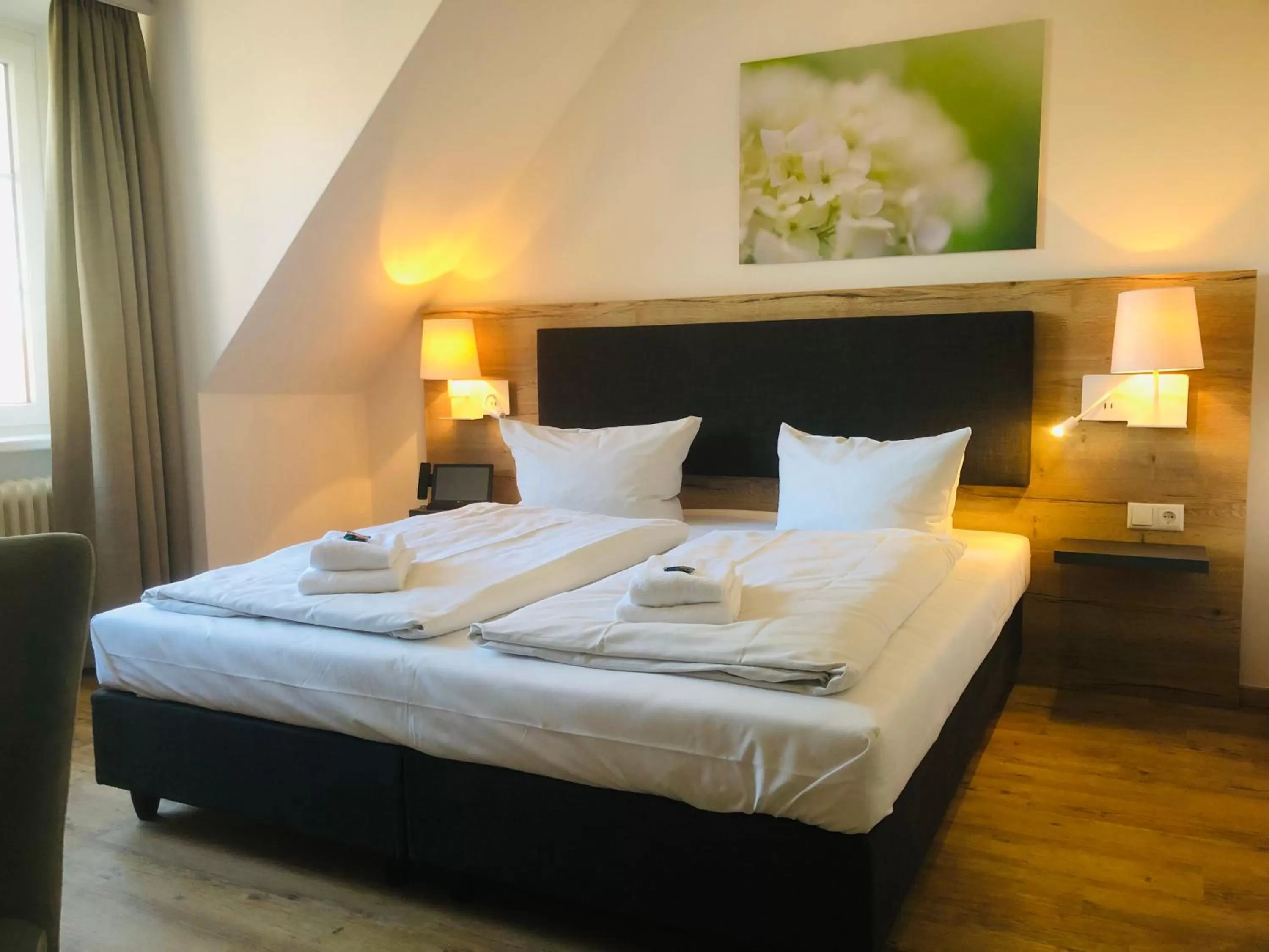 Photo of the whole room, Bed in Landhotel Gutshof im Oertzetal in Oldendorf, Südheide