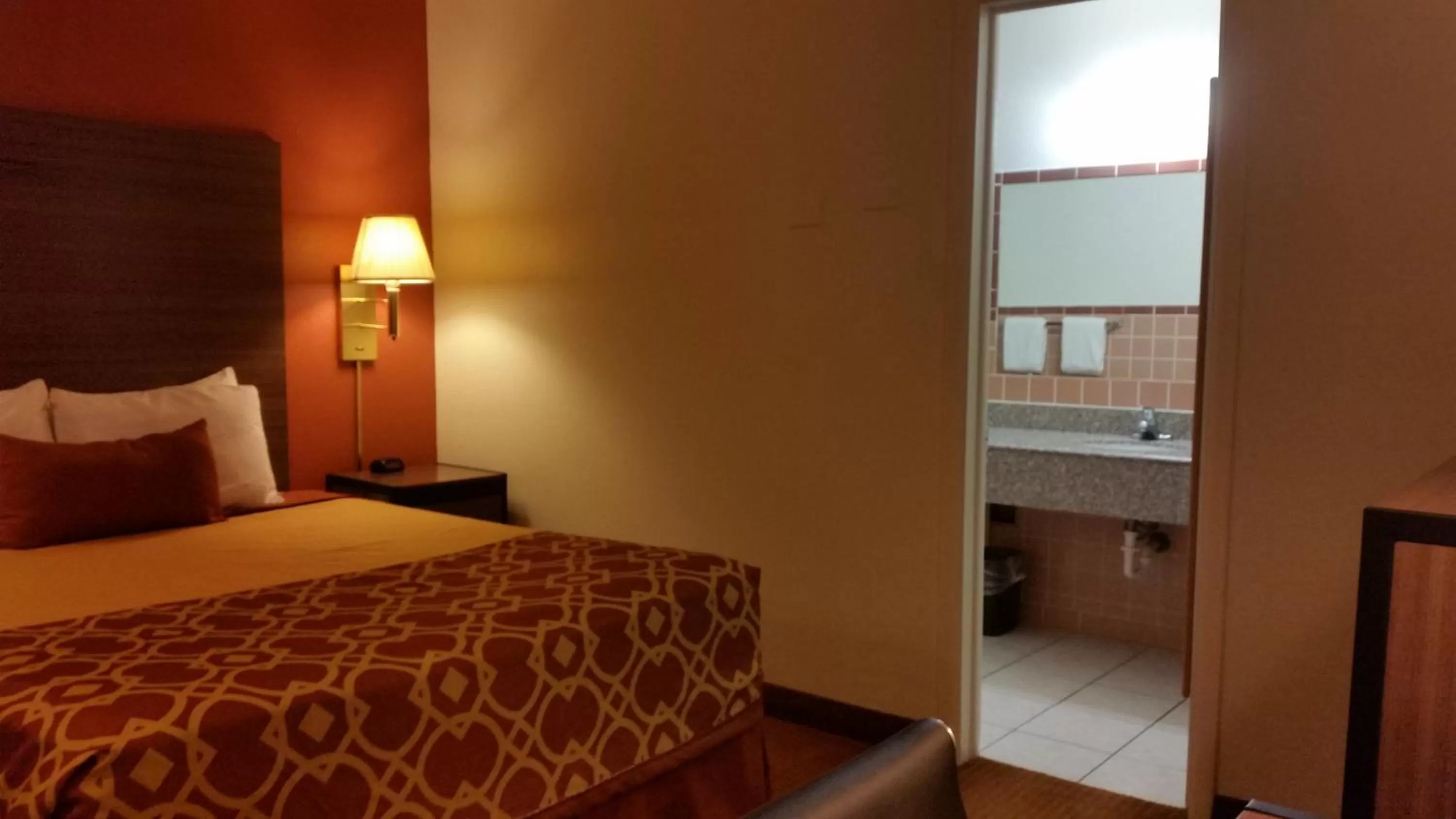 Bed in American Inn Of Liberal