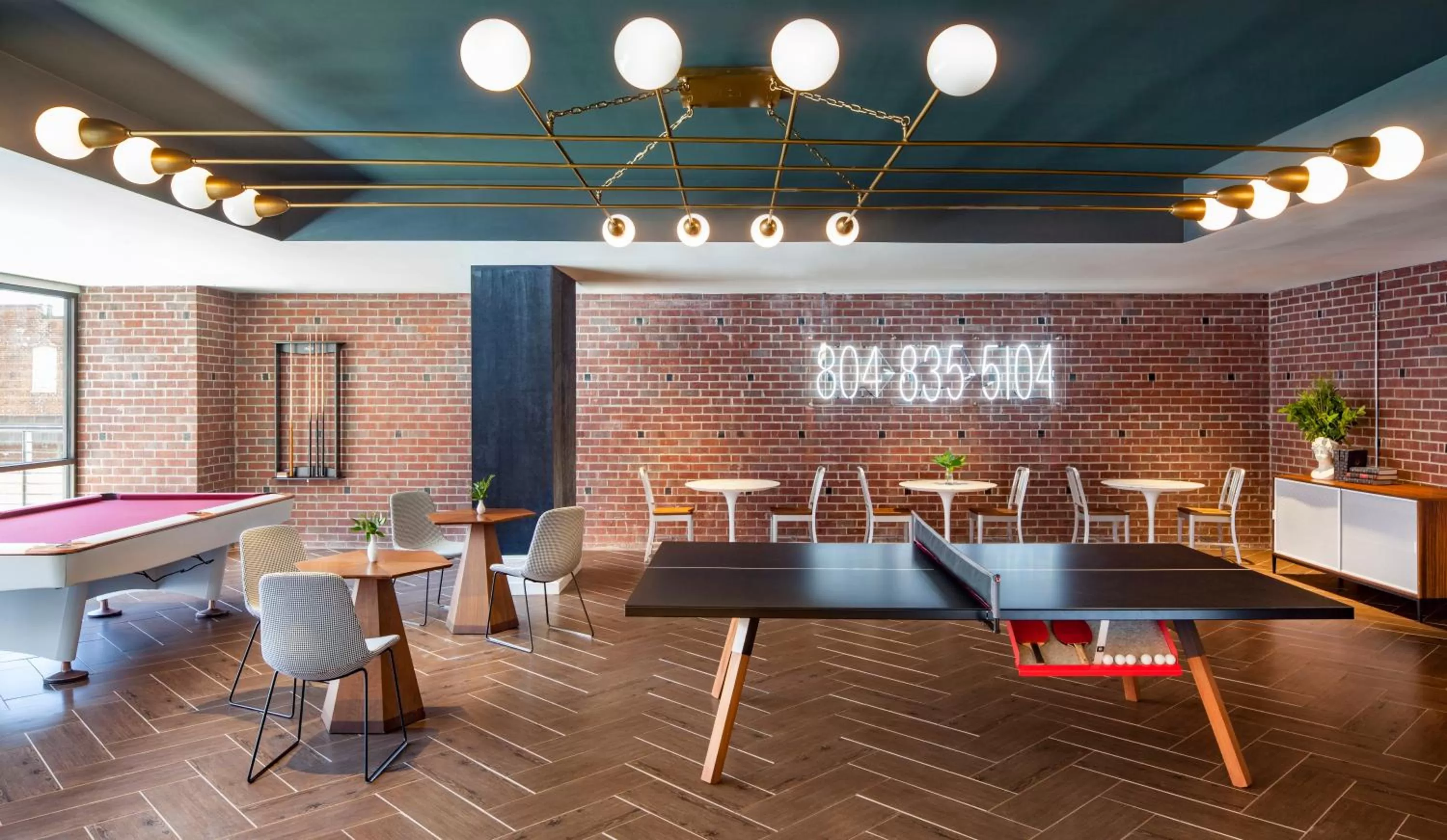 Communal lounge/ TV room in Graduate by Hilton Richmond