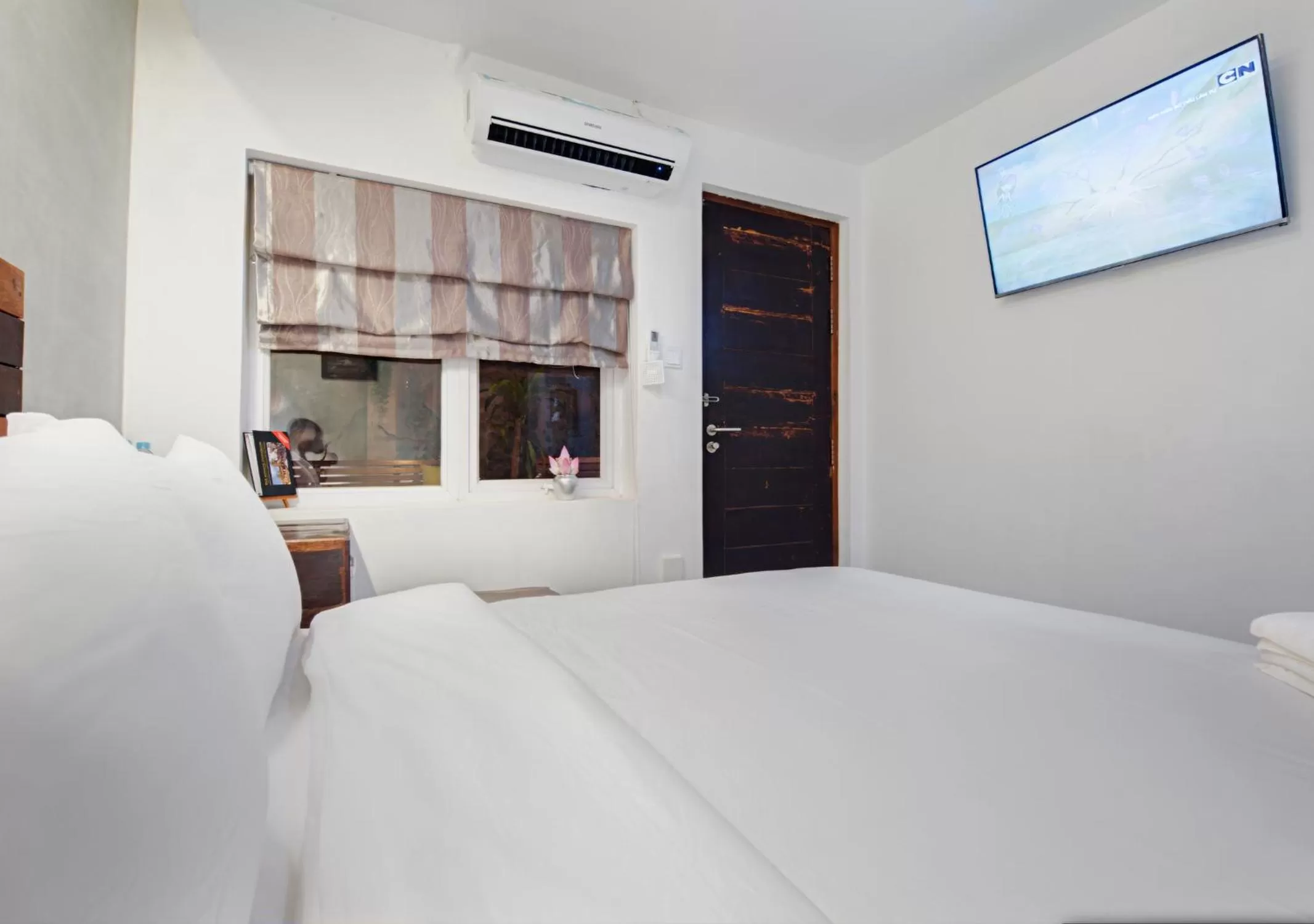 Bed in Maison Model d'Angkor