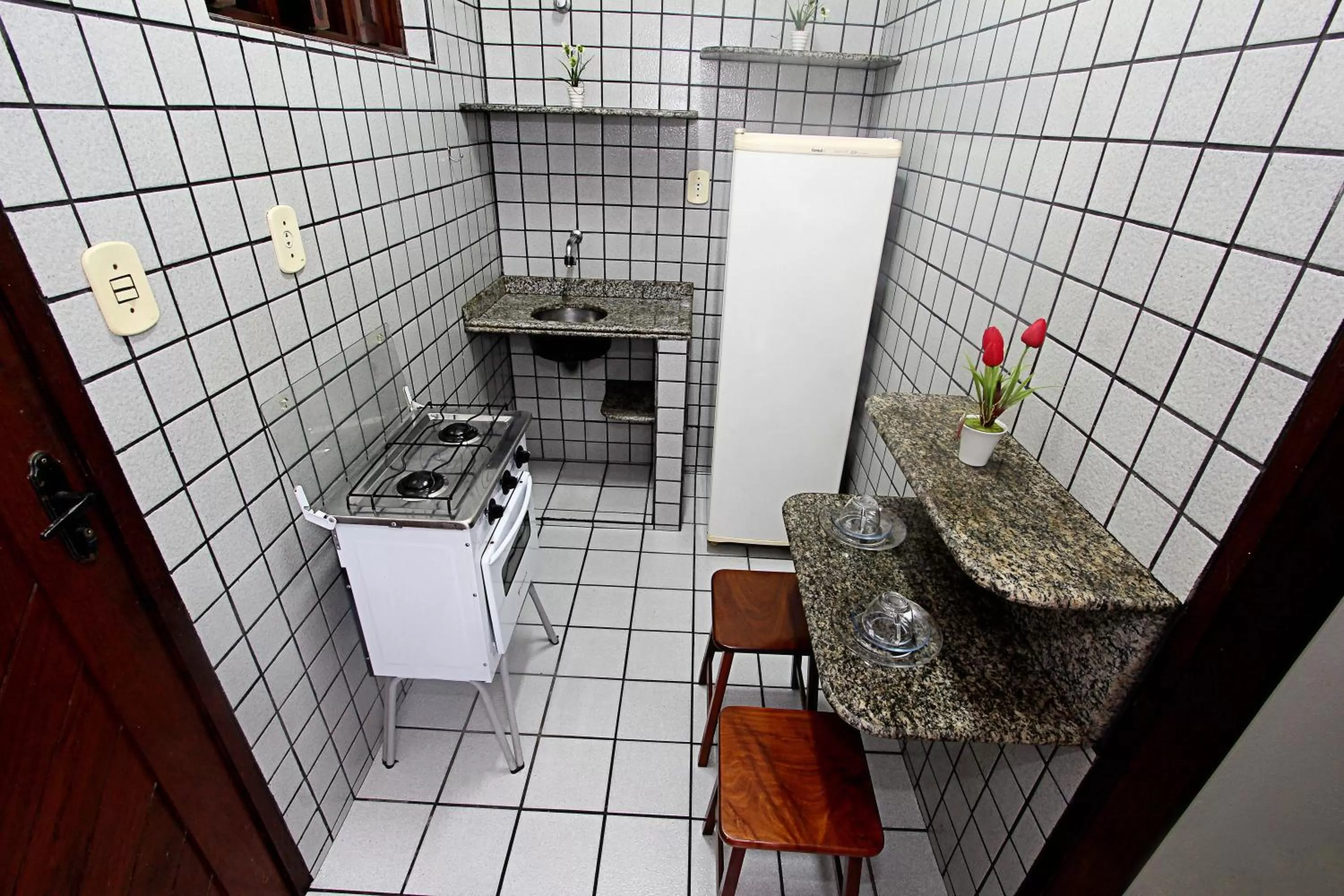 Kitchen or kitchenette in Praia Apart Hotel