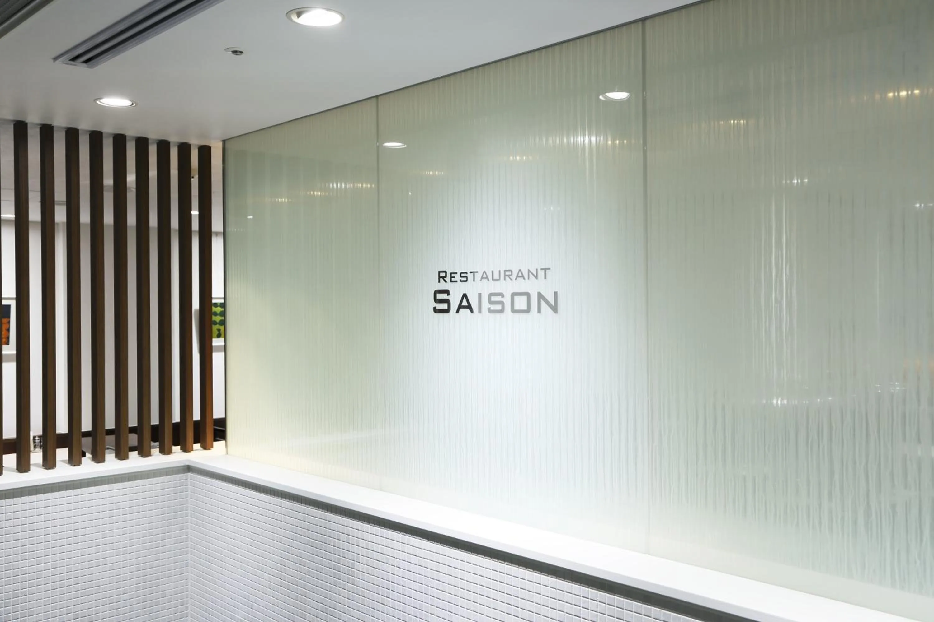 Property logo or sign in Hotel Grand City