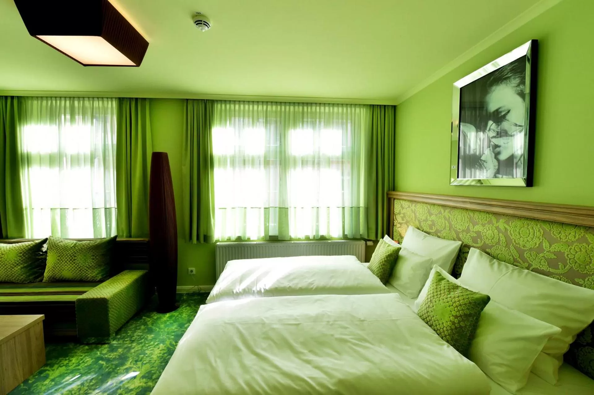 Photo of the whole room, Bed in MOMENTS Boutique Hotel