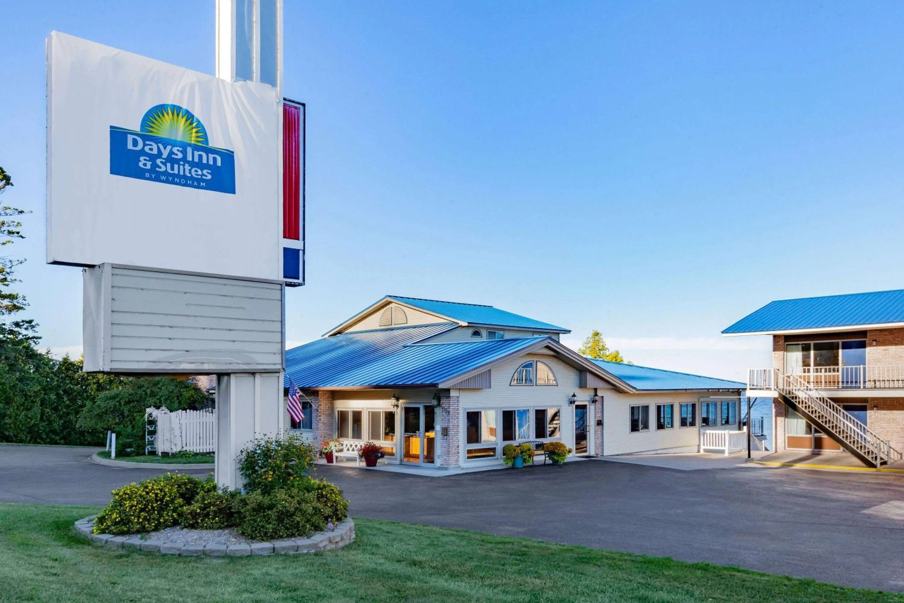Property building in Days Inn & Suites by Wyndham St. Ignace Lakefront