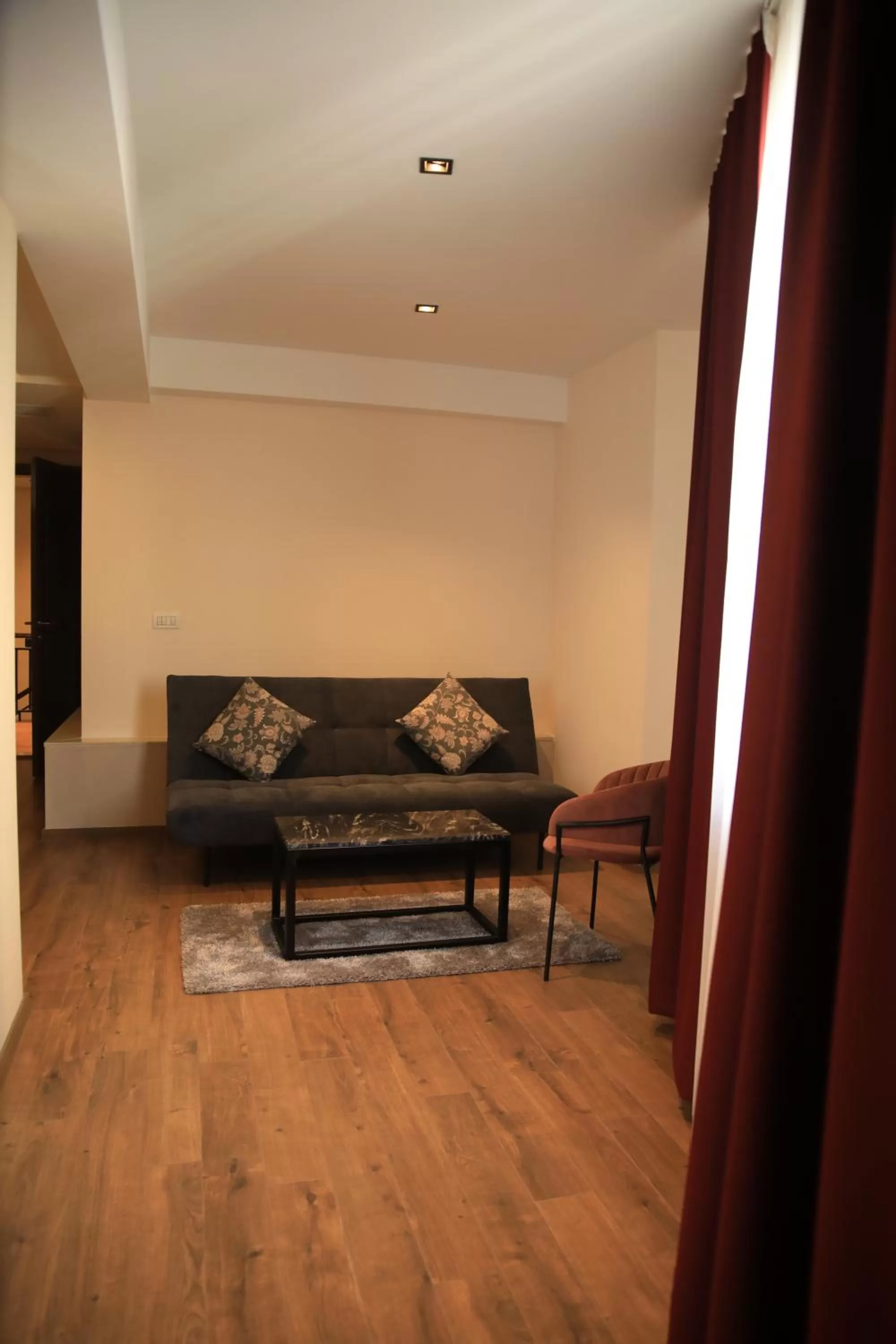 Living room, Seating Area in Monarch Hotel