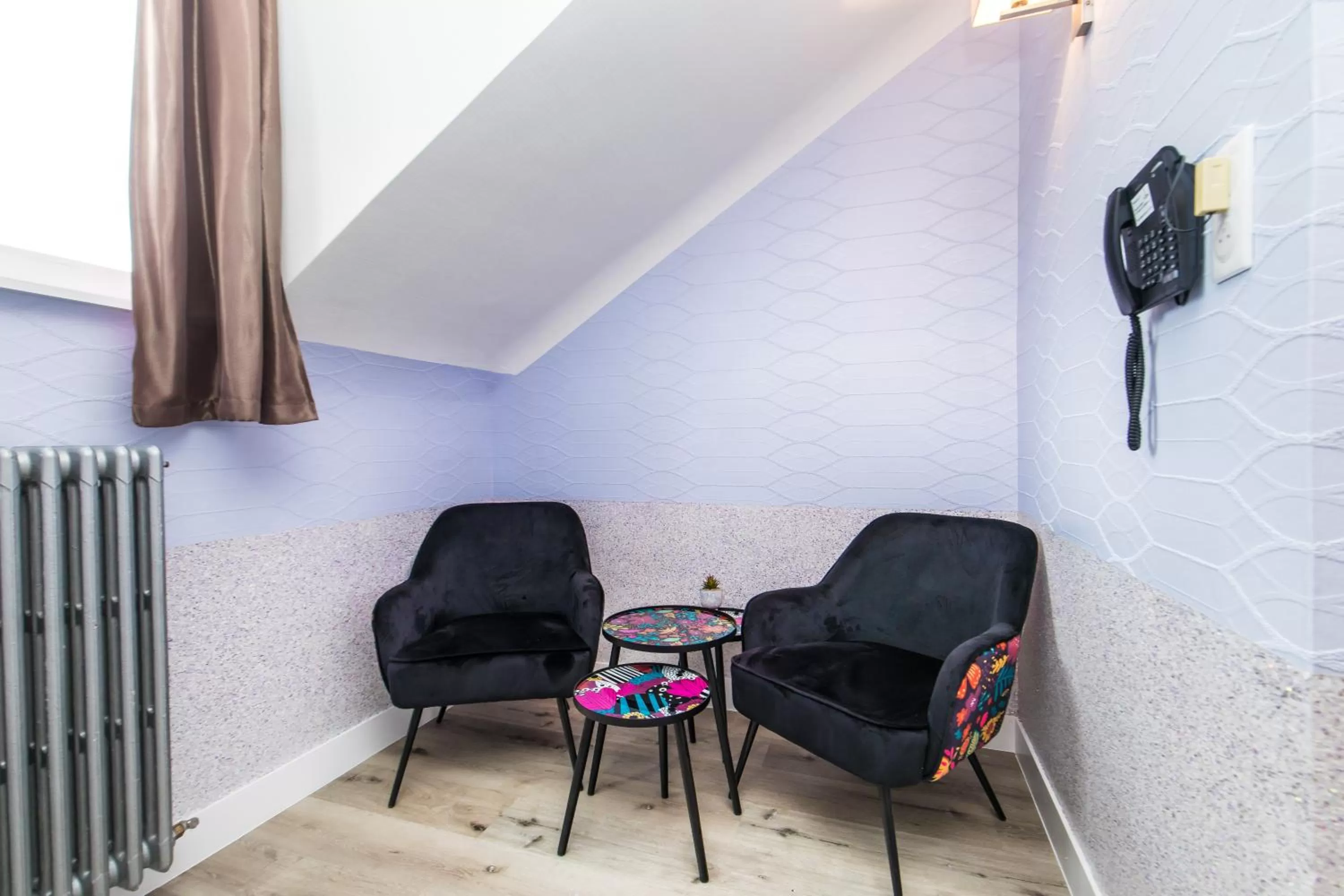 Living room in HOTEL DE PARIS MONTPARNASSE