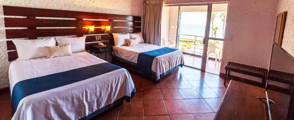 Bedroom, Bed in Las Rocas Resort & Spa