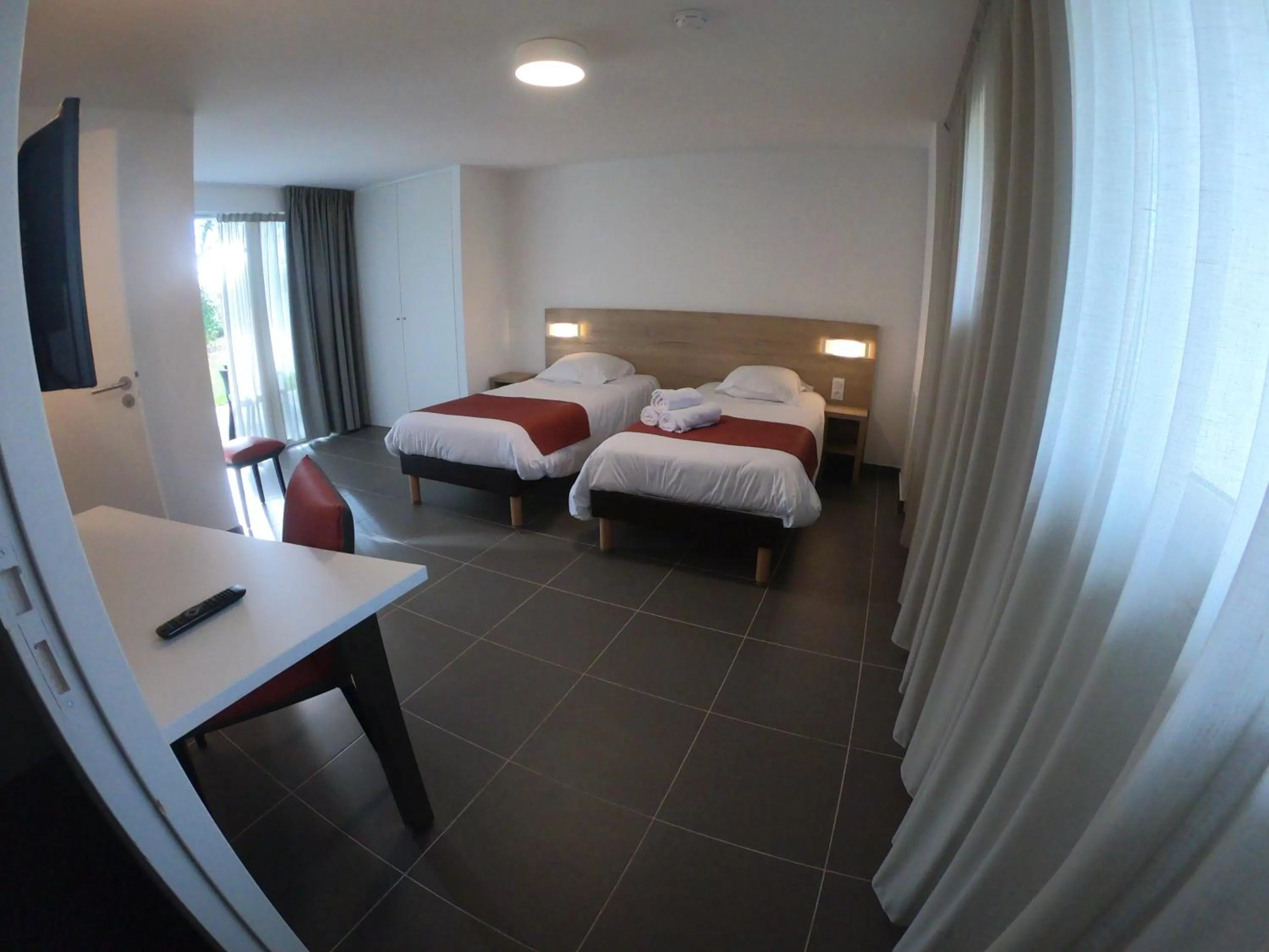 Bed in Hôtel Lac d'Orient