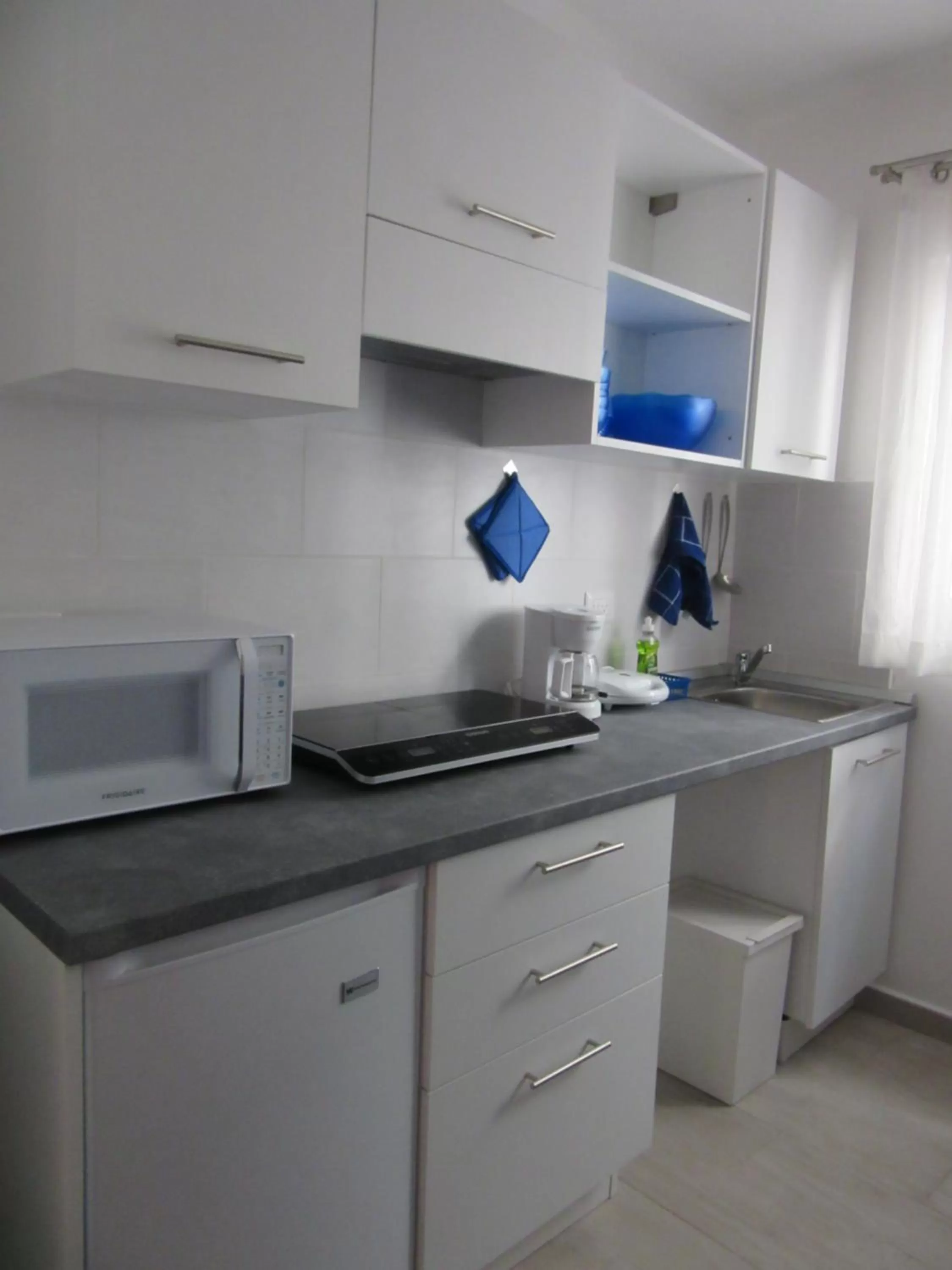 Kitchen/Kitchenette in Coral Village - "Caribbean Cocktails" Deluxe Suites & Pool