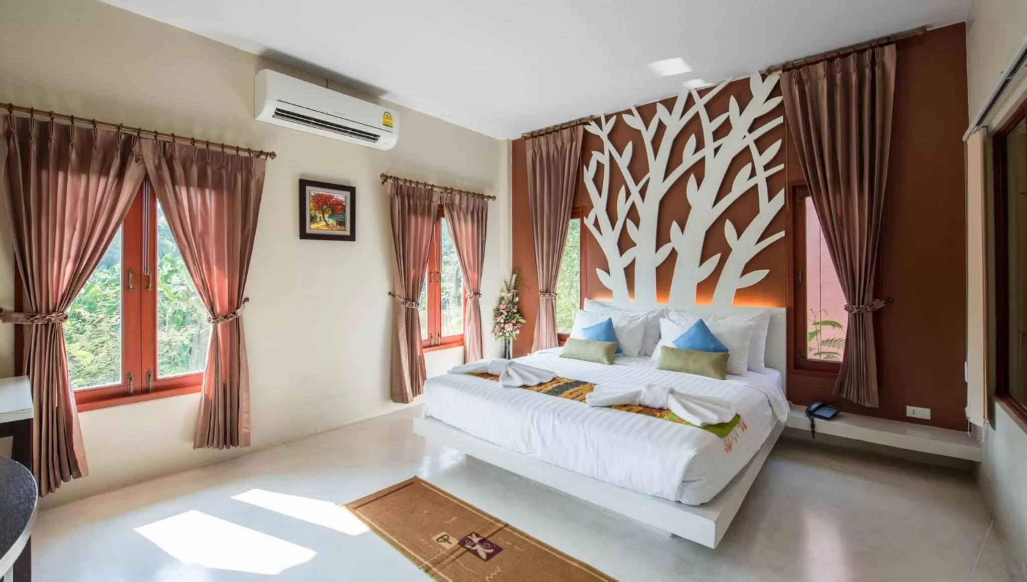 Bed in Panlaan Boutique Resort