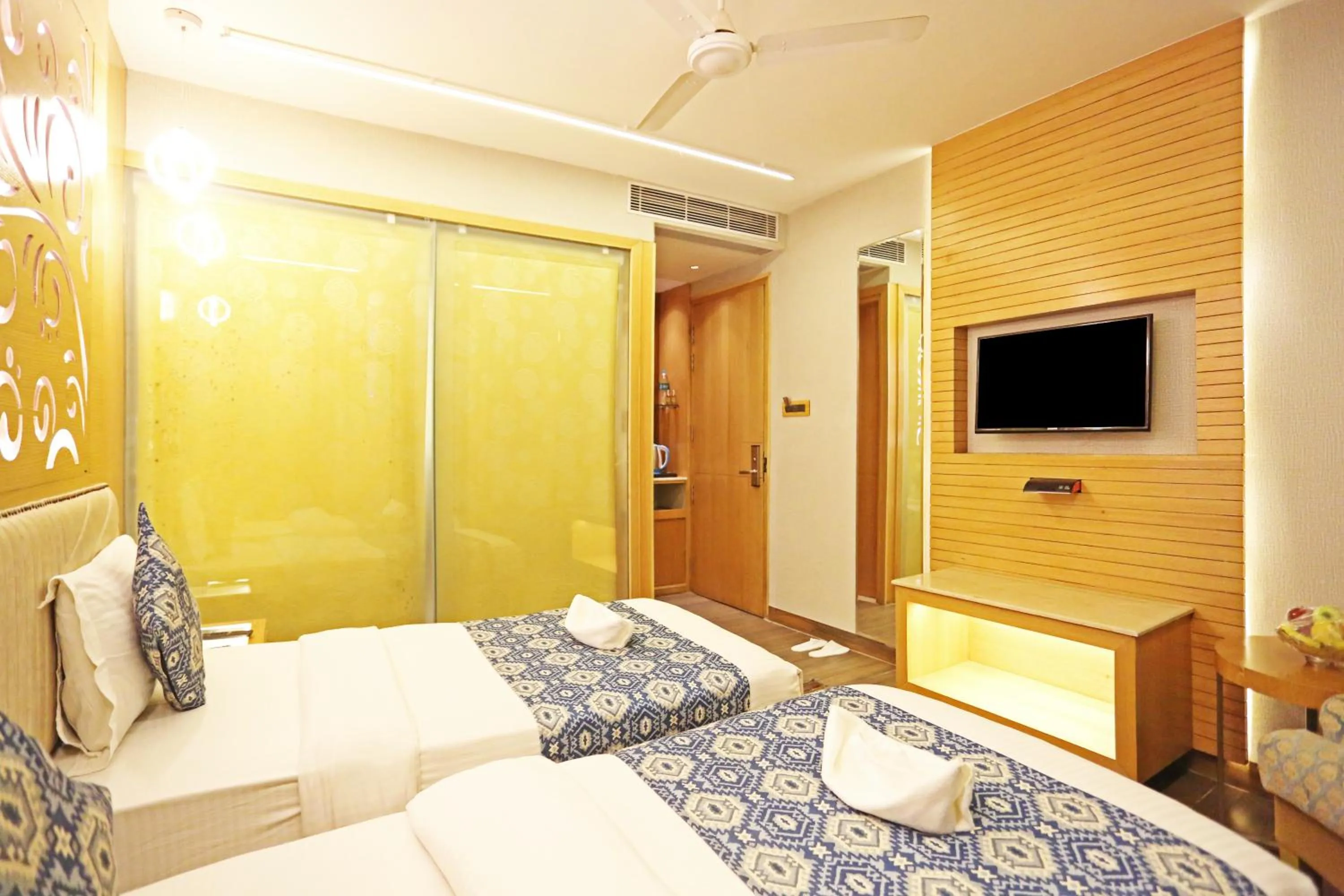 Bed in JRD Luxury-Business Hotel