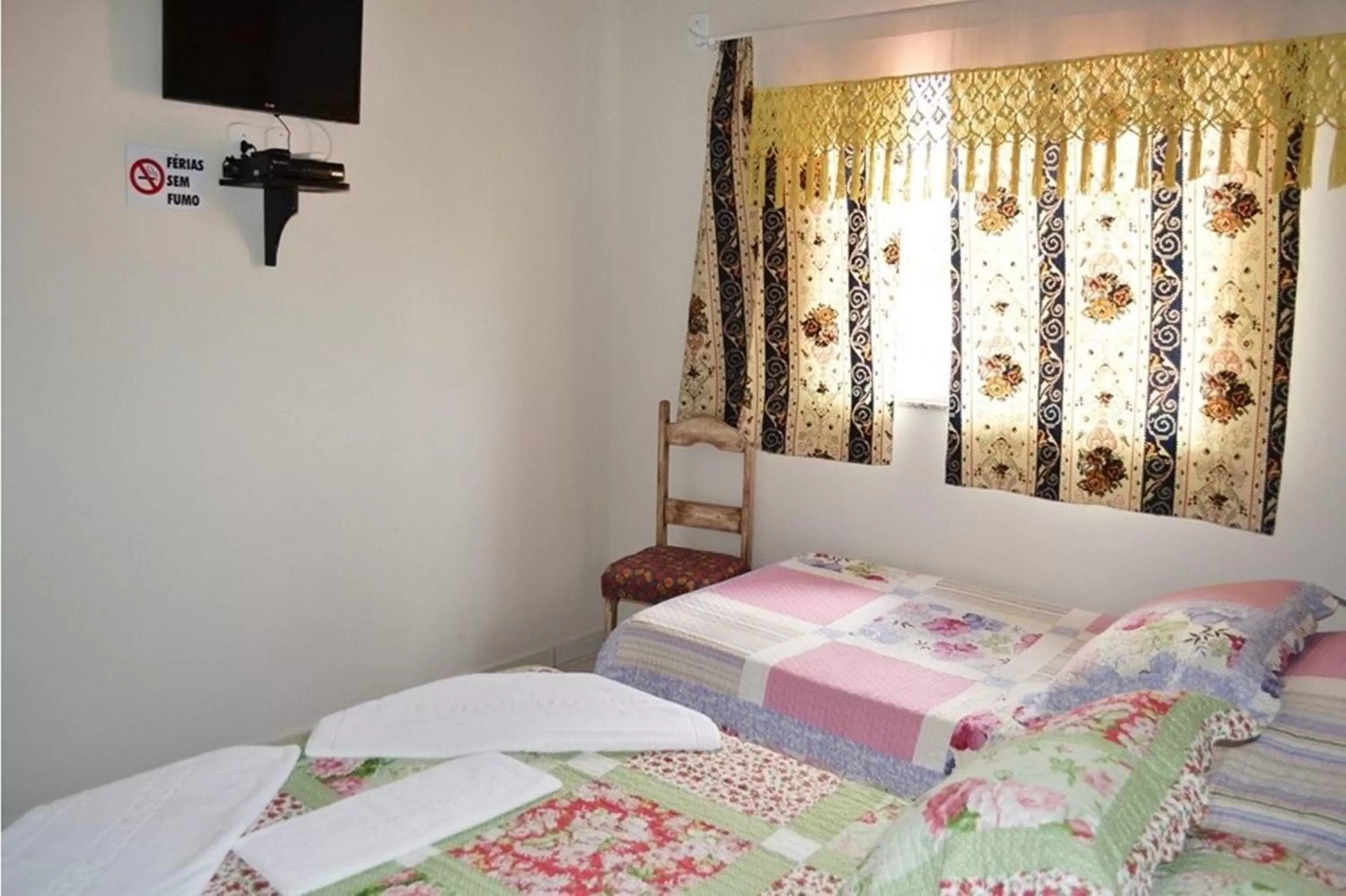 Bed in Pousada Miosotis