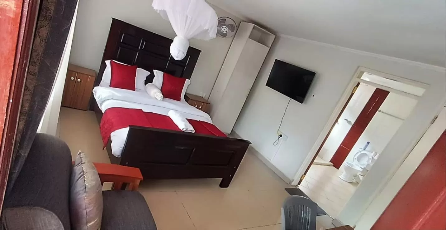 Toilet, Bed in Milimani Comfort