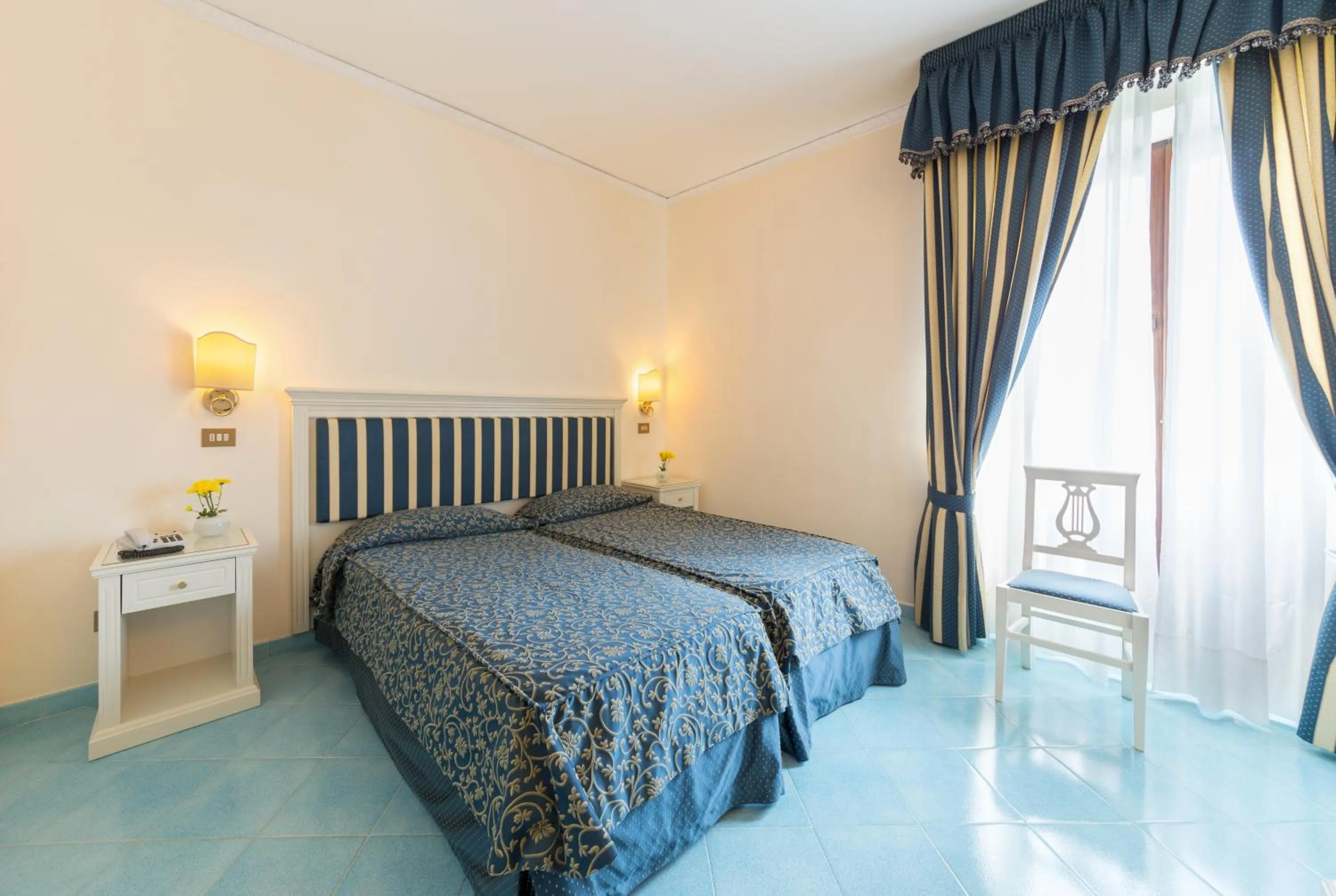 Bed in Hotel Iaccarino