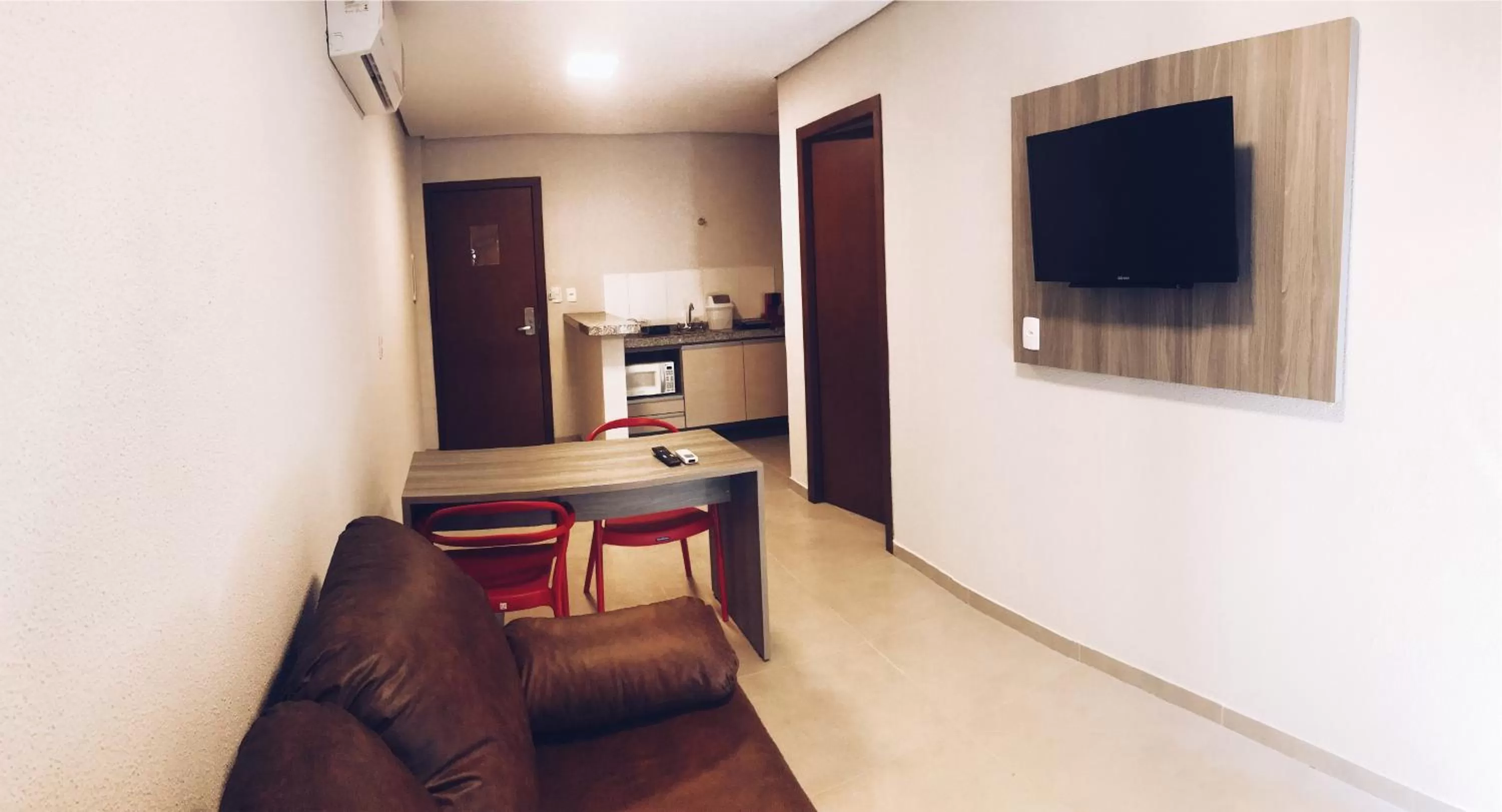 Communal lounge/ TV room in 103 Hotel & Flats