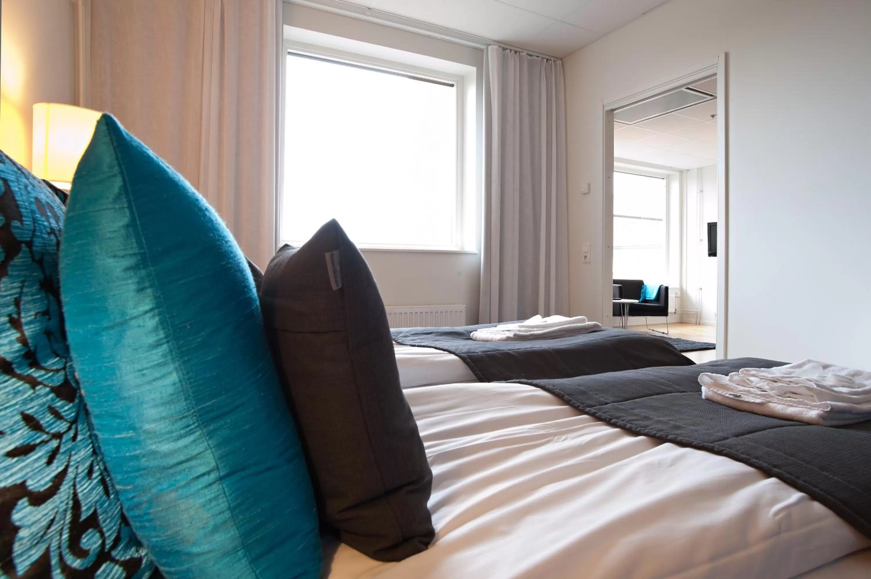 Bed in Sky Hotel Apartments Tornet