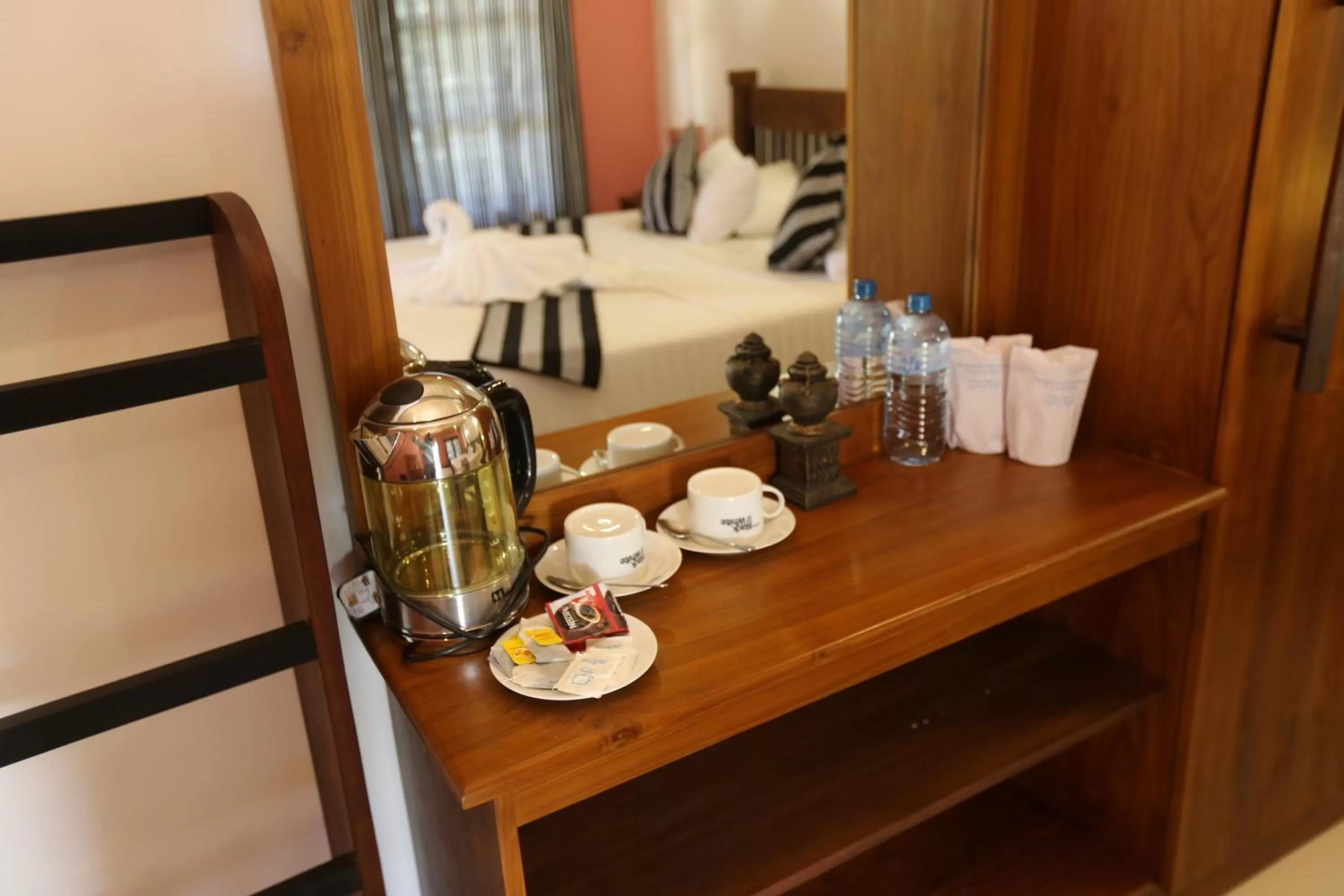 Coffee/tea facilities, Bed in Eco Hotel Black & White - Anuradhapura