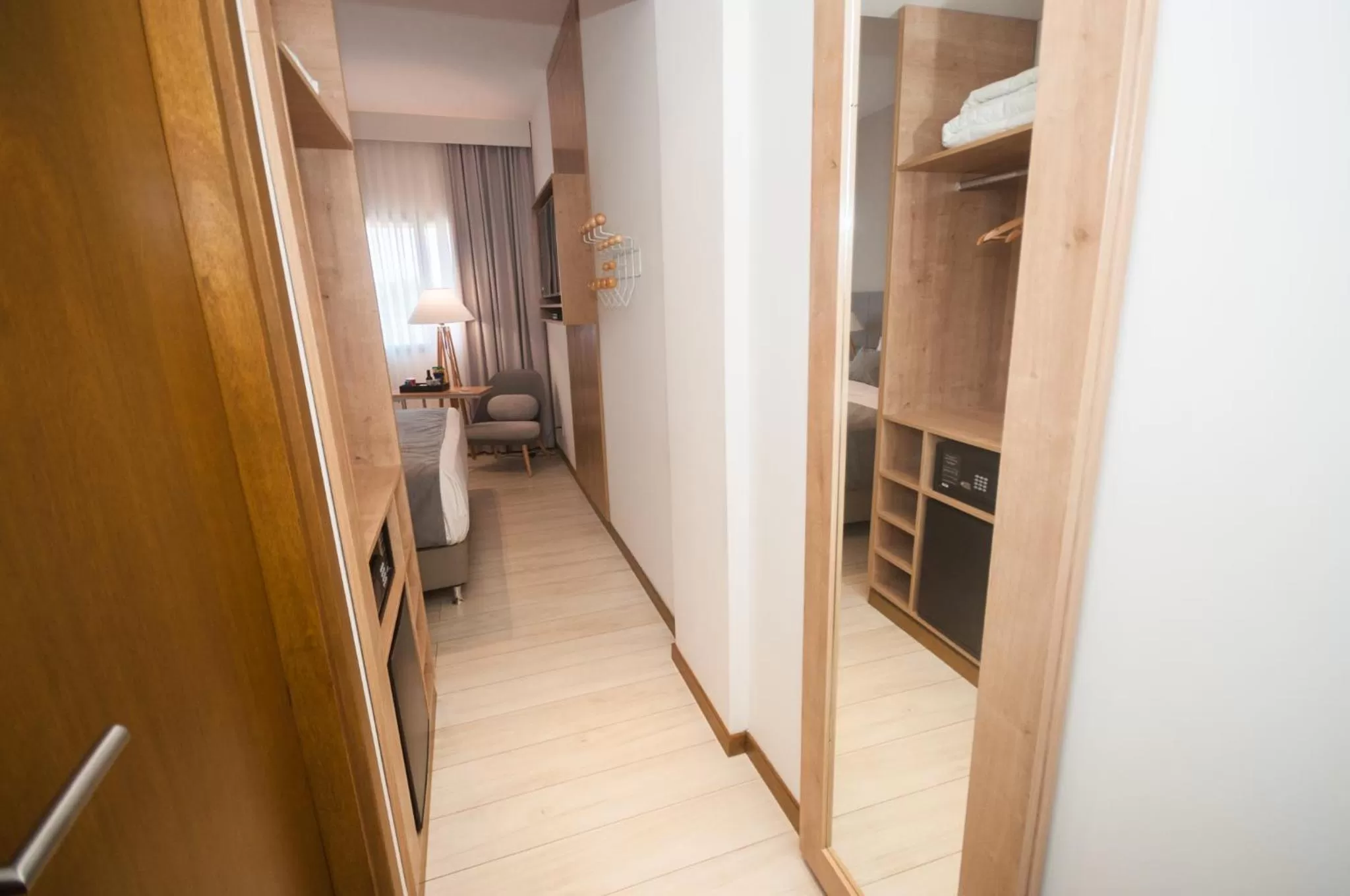 Seating area, Bed in Dazzler by Wyndham Ciudad del Este