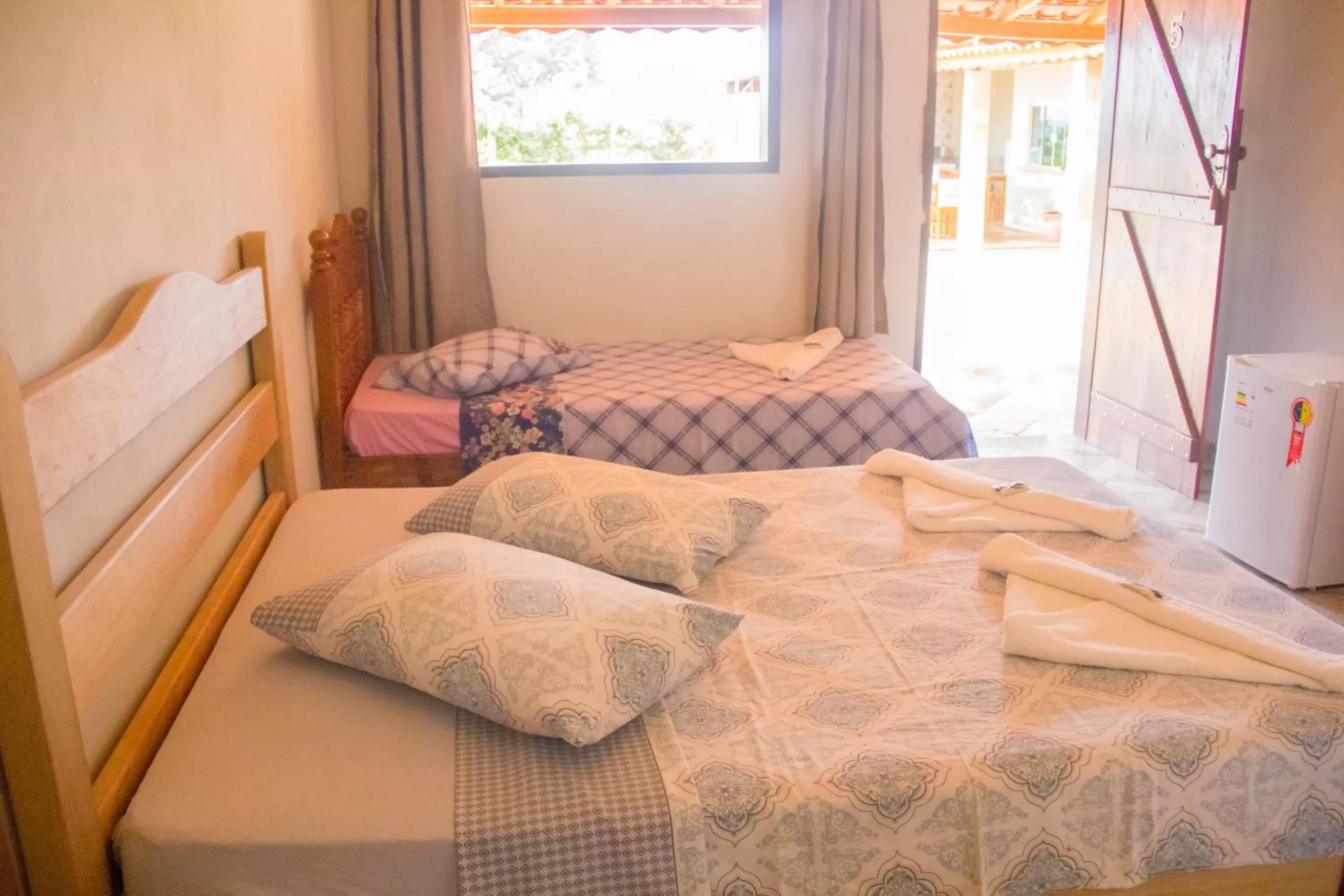 Bed in Pousada e Chales Por do Sol