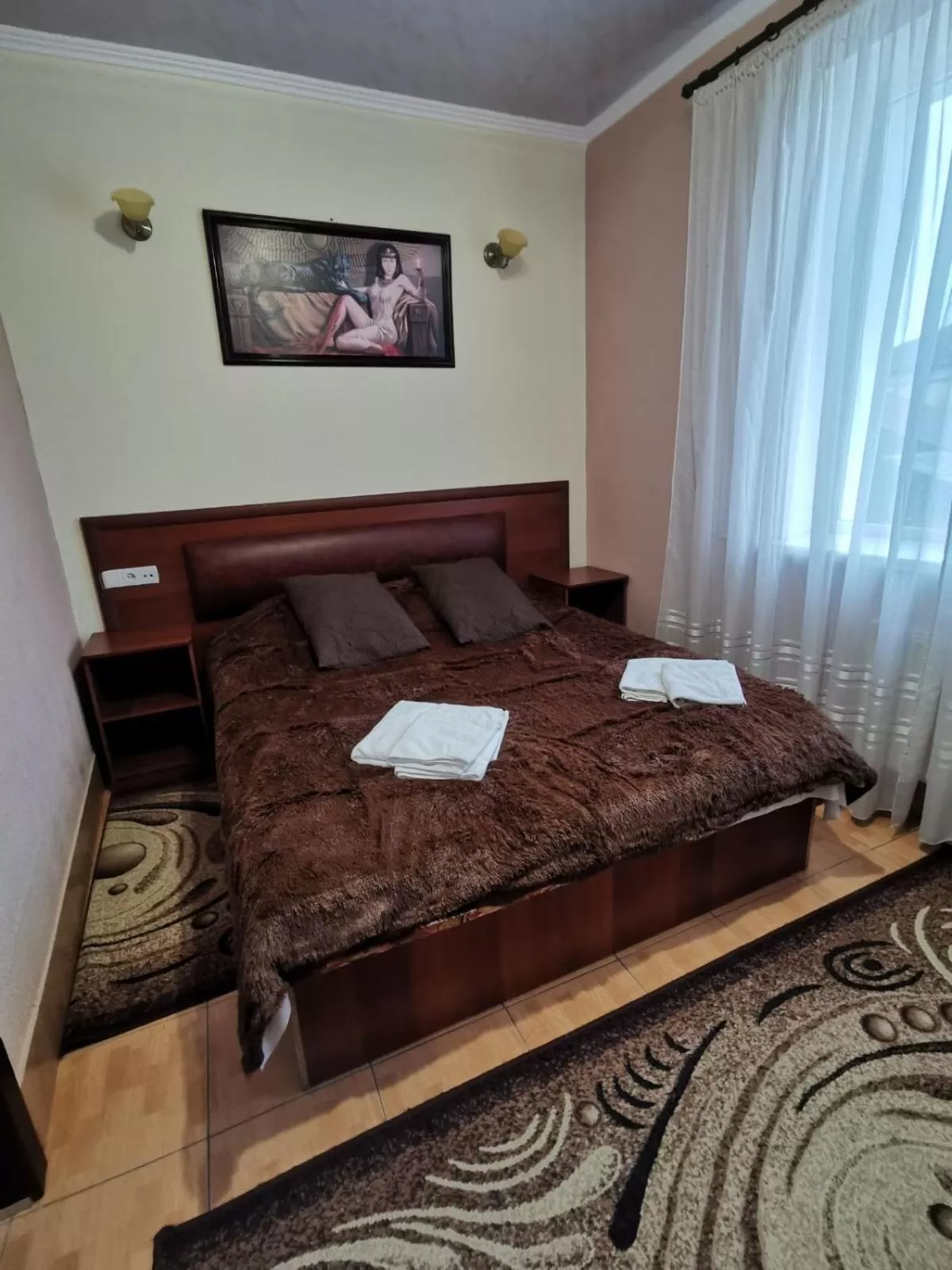 Bed in Monte-Kristo Hotel
